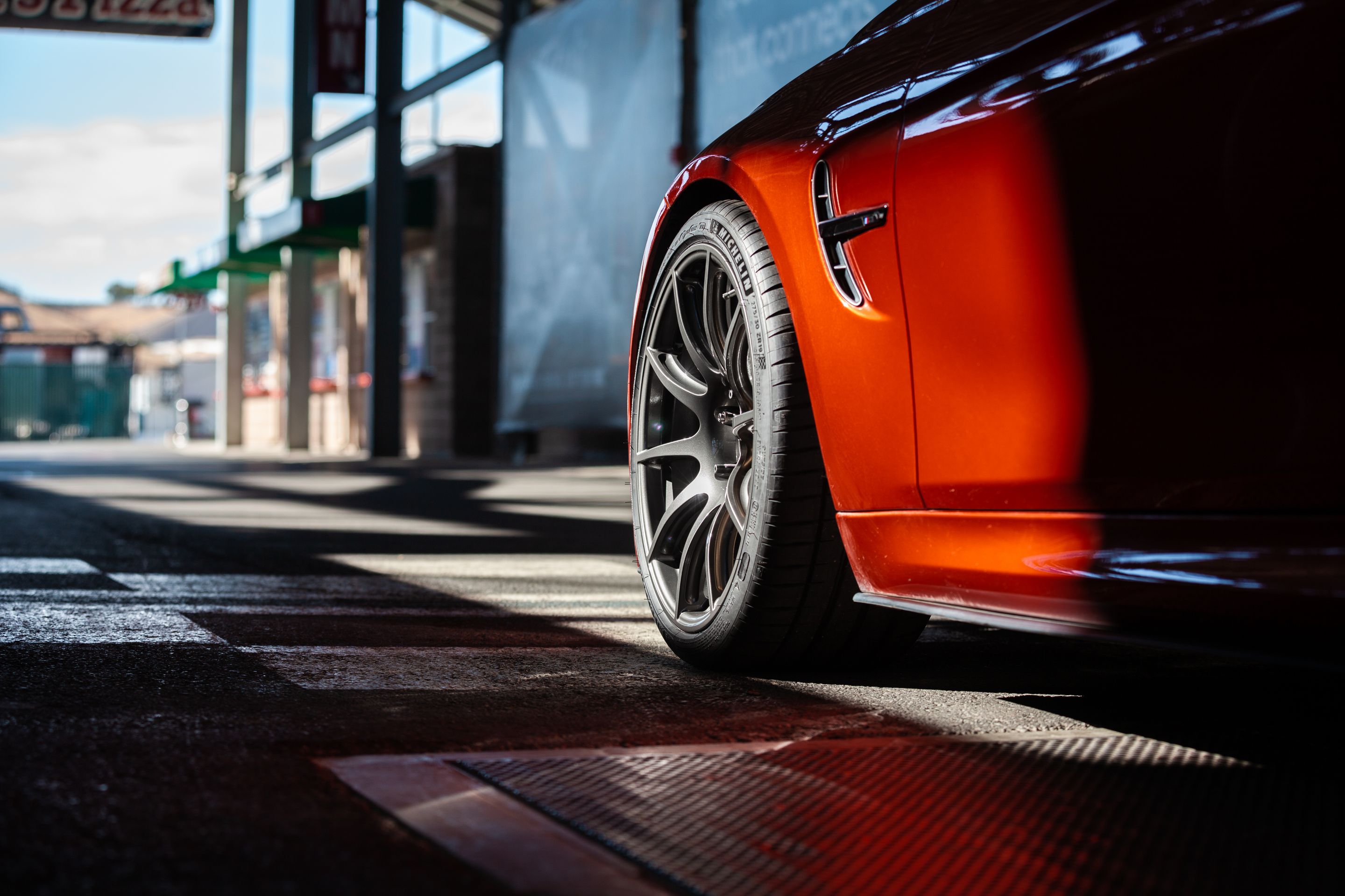 Orange BMW F80 M3 with 19" SM-10 Apex wheels in Anthracite