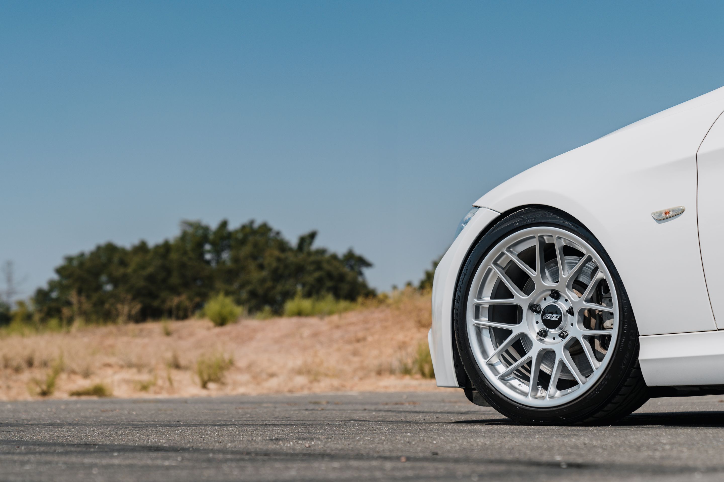 White BMW E90 LCI Sedan 3 Series with 18" ARC-8 Apex wheels in Hyper Silver