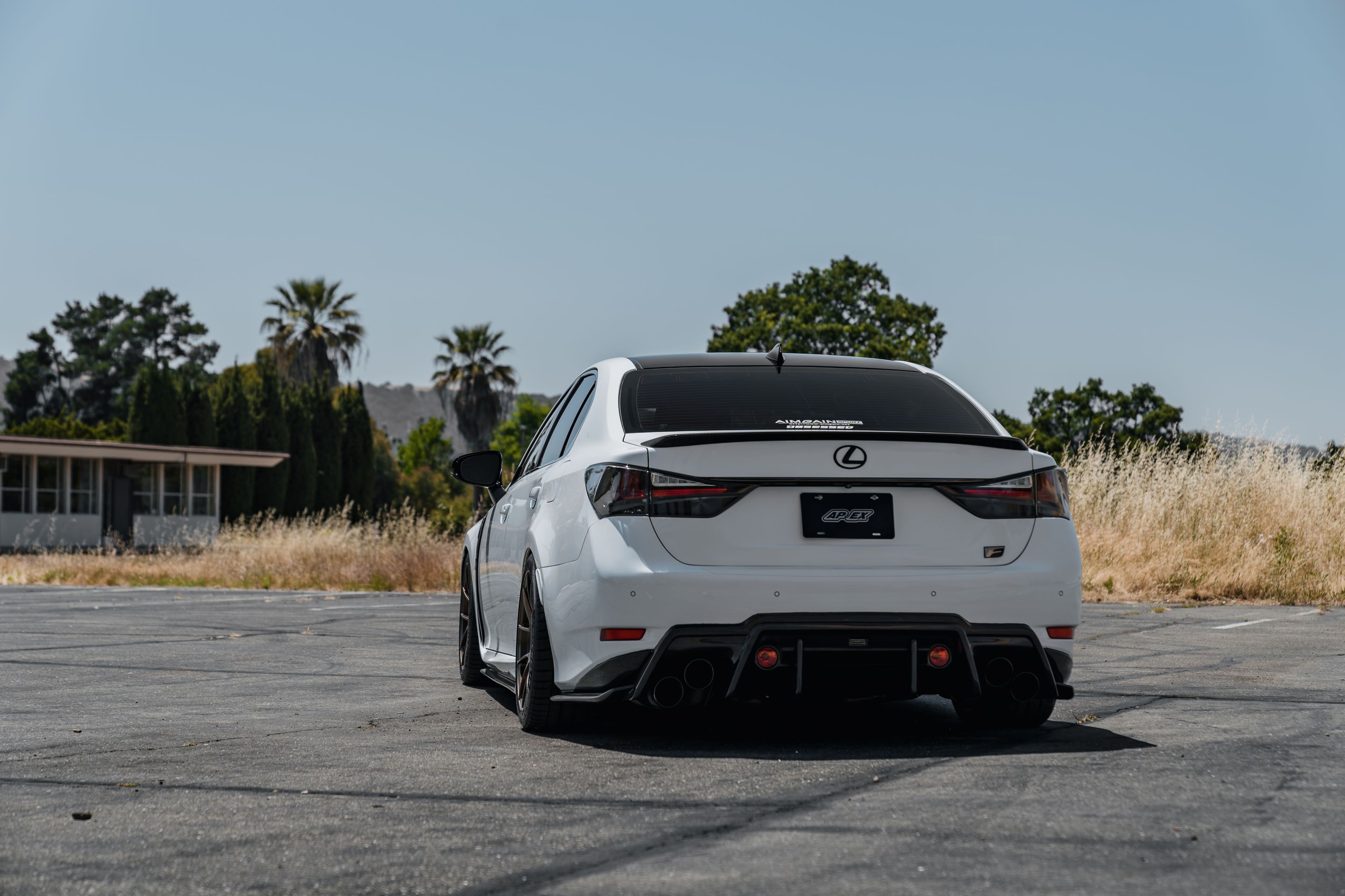 White Lexus URL10 GS-F with 18" VS-5RS Apex wheels in Satin Bronze