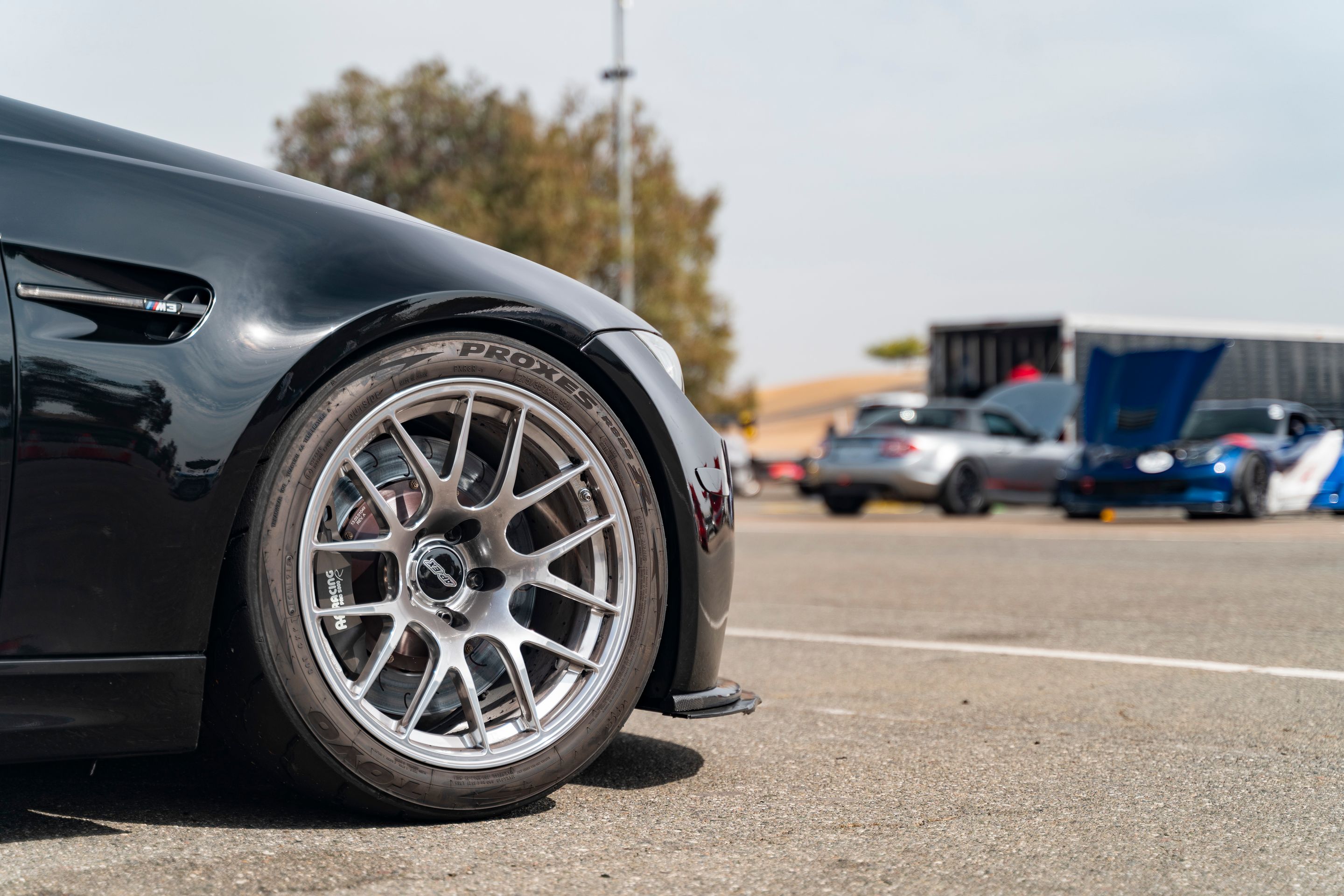 Black BMW E92 Coupe M3 with 18" EC-7R Apex wheels in Brushed Clear