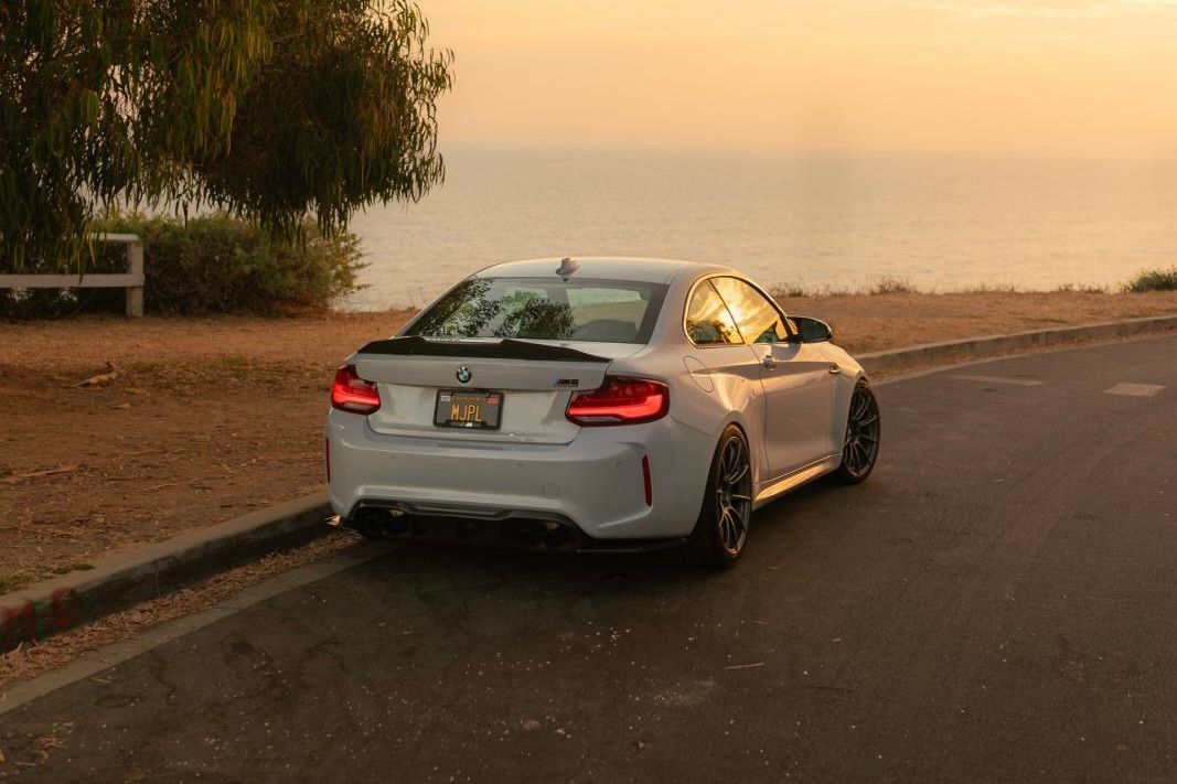 Silver BMW F87 M2 with 19" SM-10RS Apex wheels in Anthracite