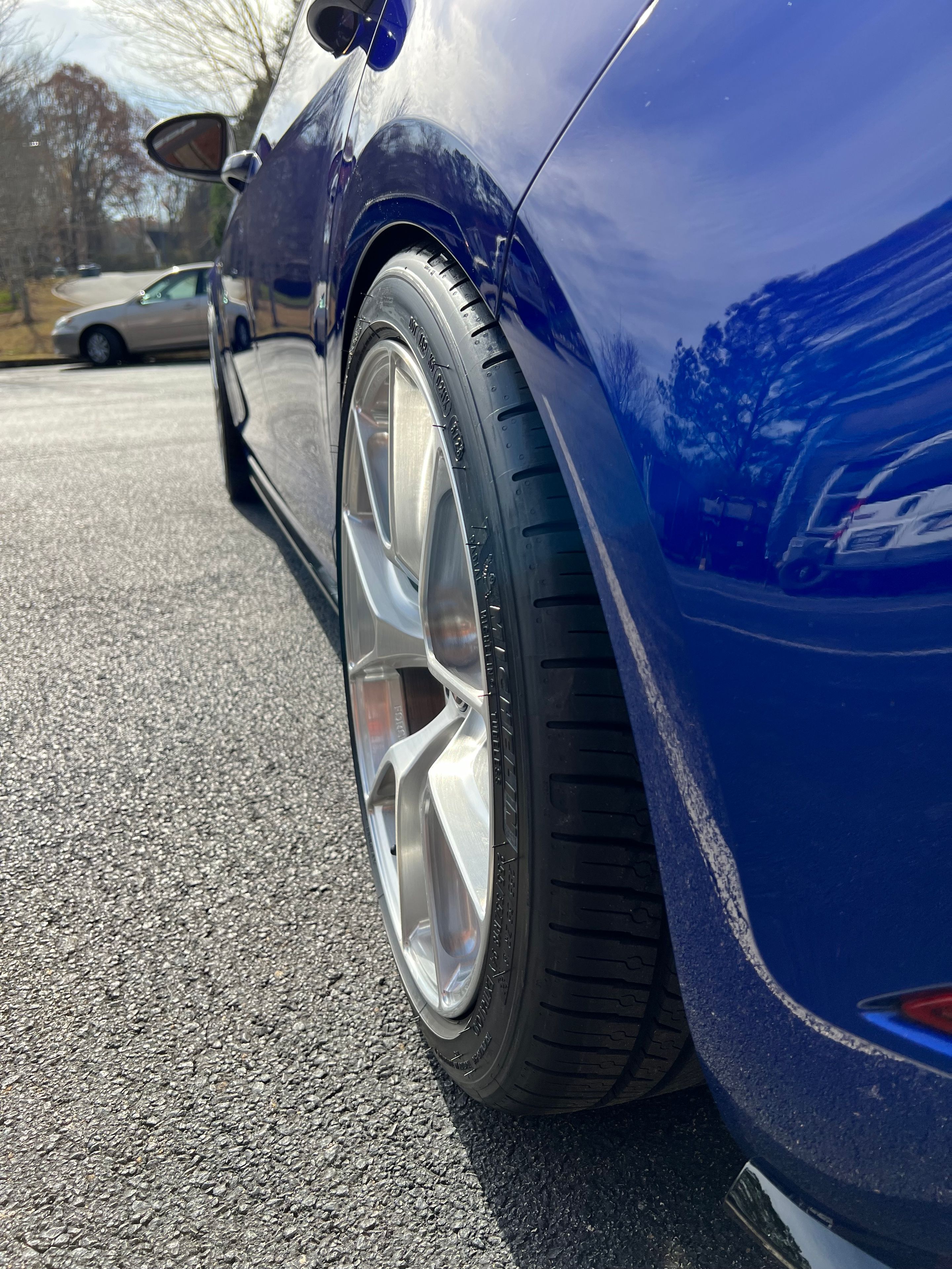 Blue VW MK7 Golf R with 18" VS-5RS Apex wheels in Brushed Clear