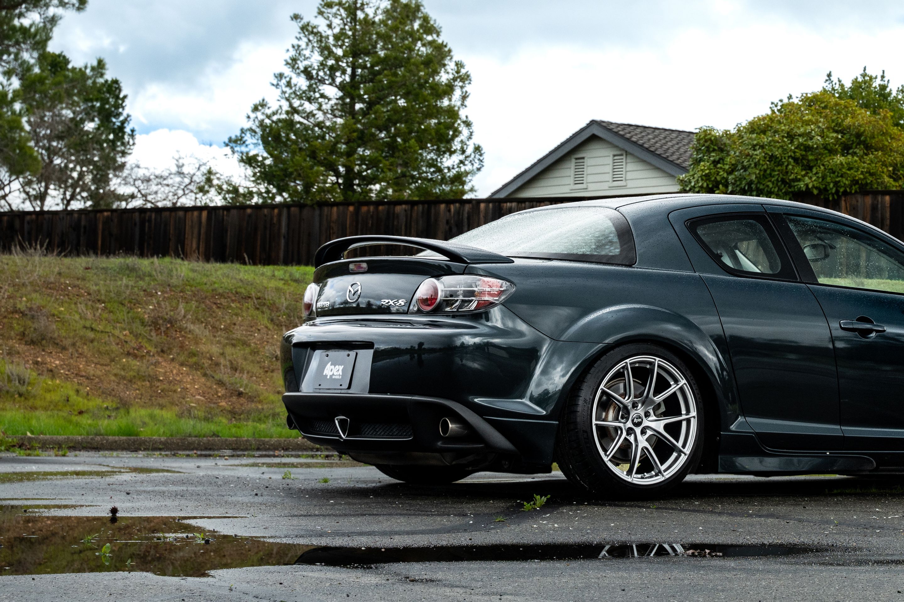 Green Mazda RX-8 with 18" VS-5 Apex wheels in Hyper Black