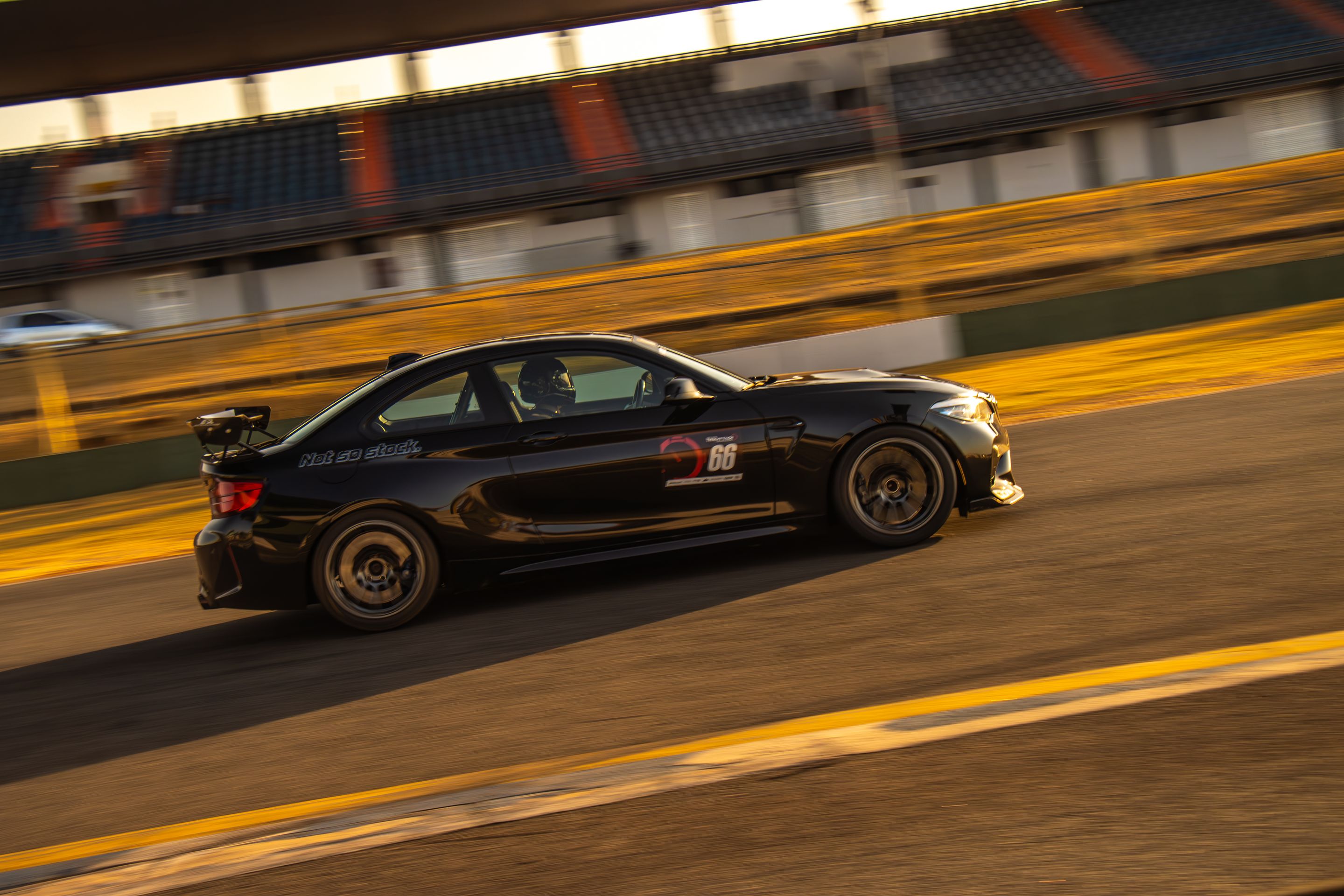 Black BMW F87 M2 with 18" SM-10RE Apex wheels in Anthracite
