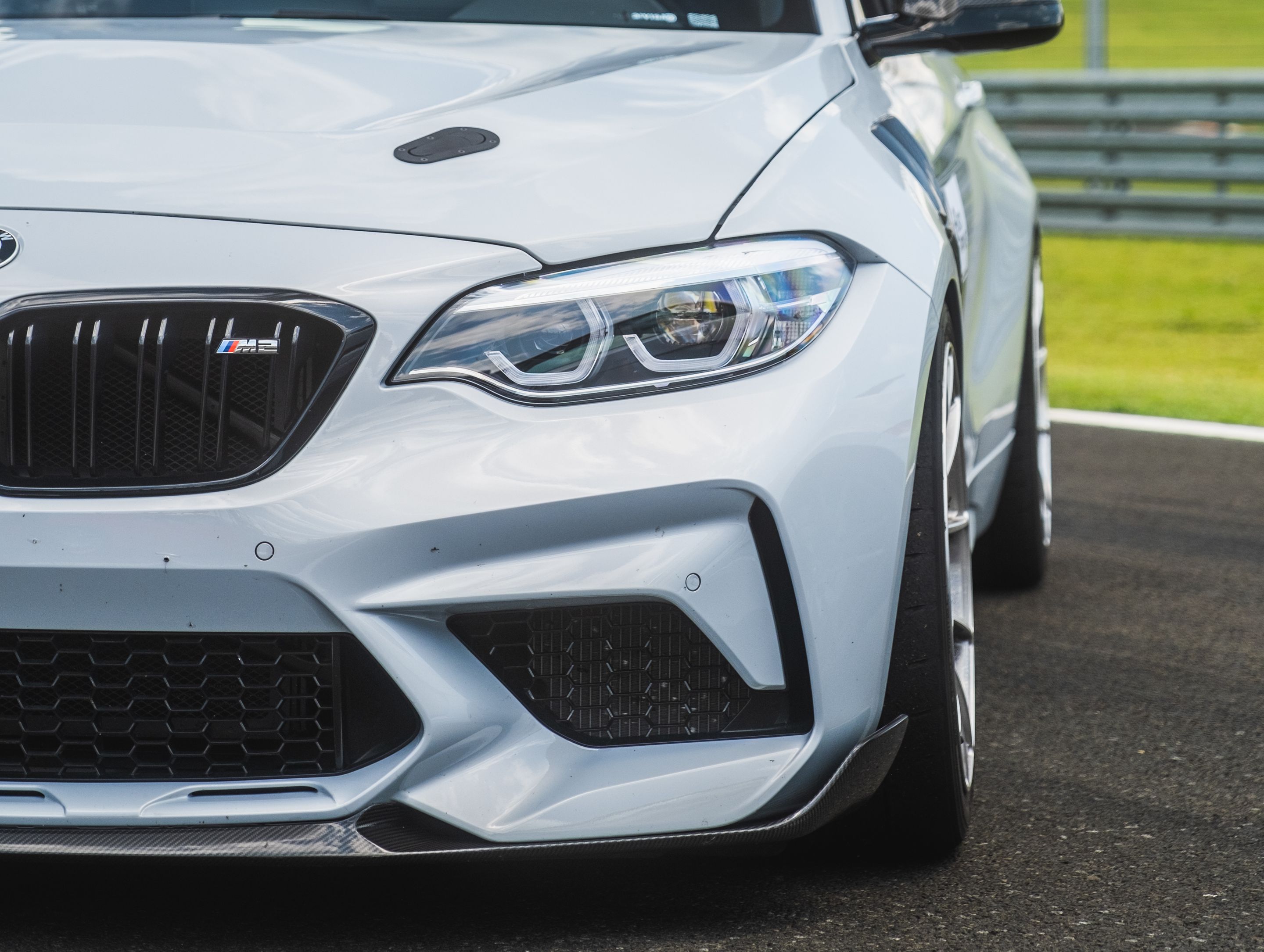 Silver BMW F87 M2 with 18" VS-5RS Apex wheels in Brushed Clear