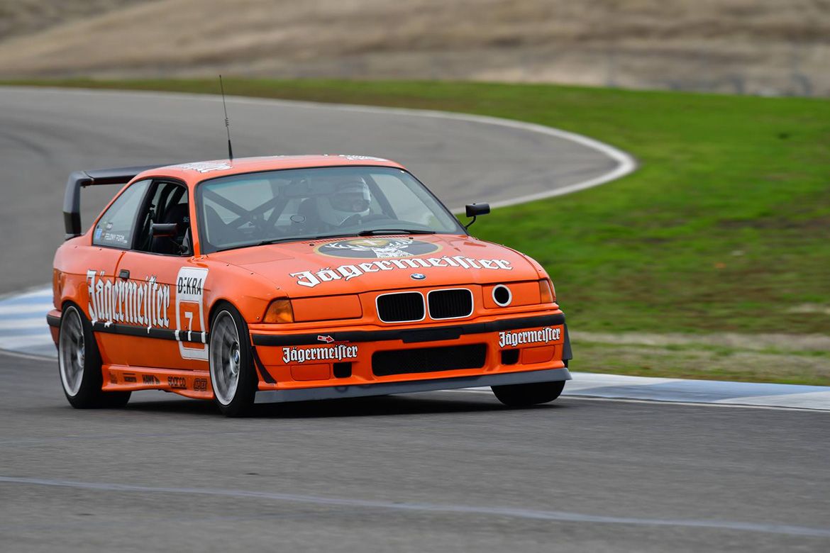 Orange BMW E36 3 Series with 17" ARC-8 Apex wheels in Hyper Silver