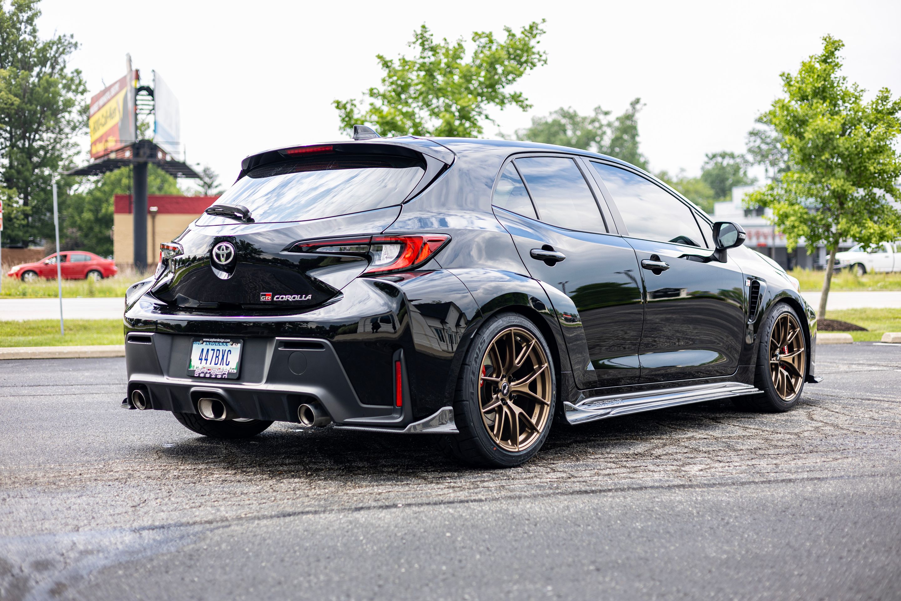 Black Toyota GR Corolla with 18" VS-5RS Apex wheels in Satin Bronze