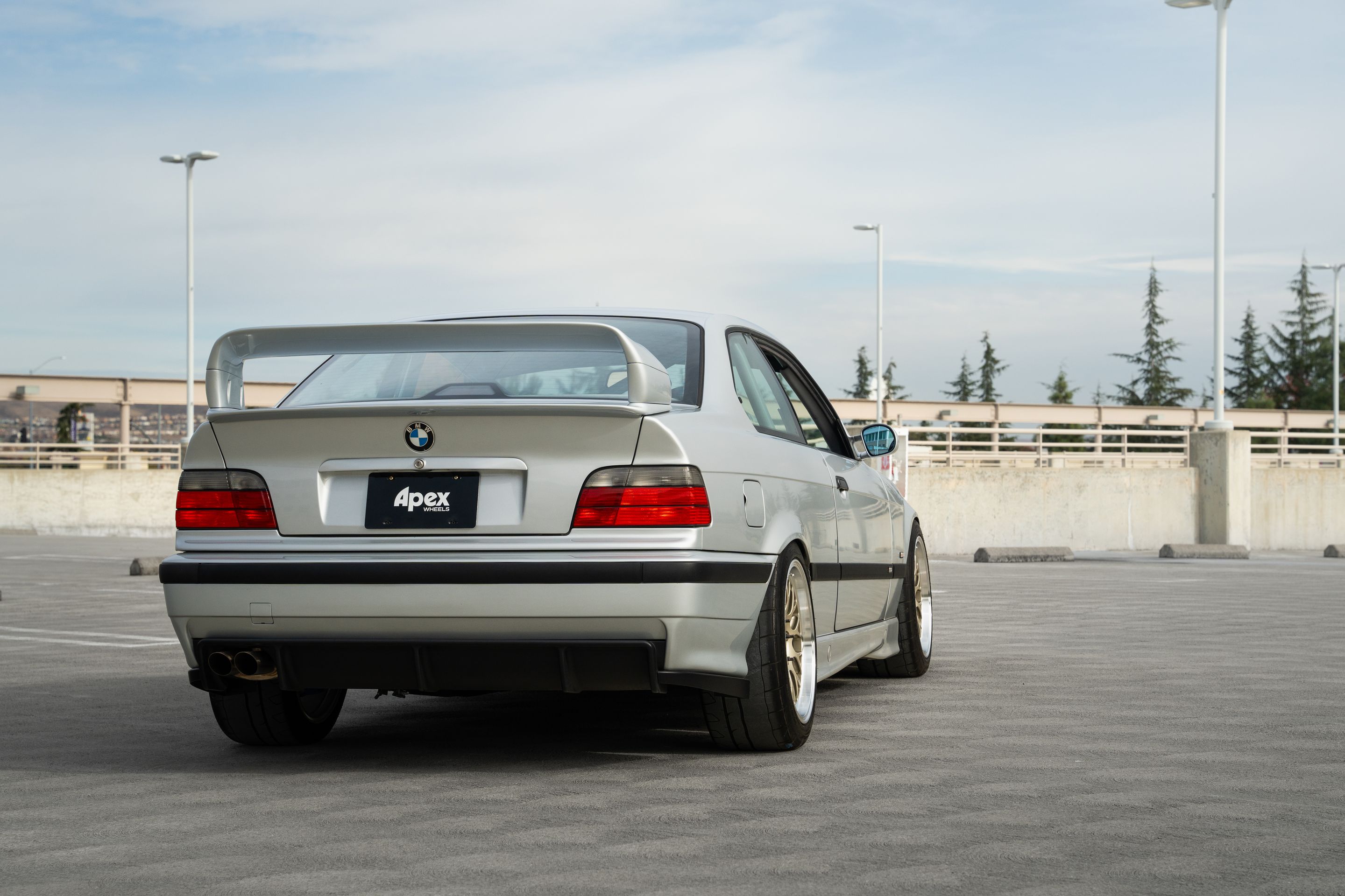 Silver BMW E36 3 Series with 17" ML-10RT Apex wheels in Machined Lip Gloss Motorsport Gold