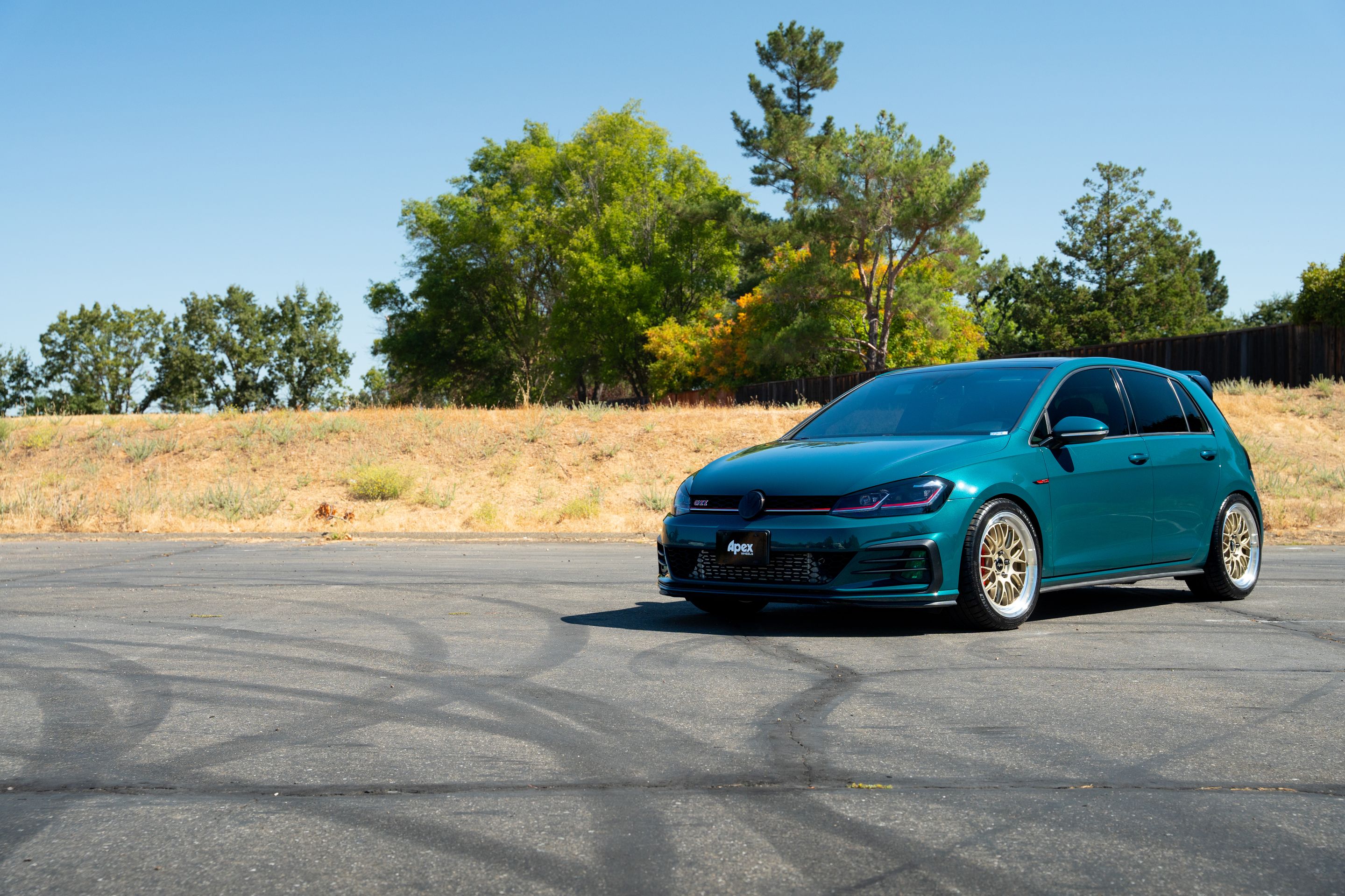 Green VW MK7 GTI with 18" ML-10RT Apex wheels in Machined Lip Gloss Motorsport Gold