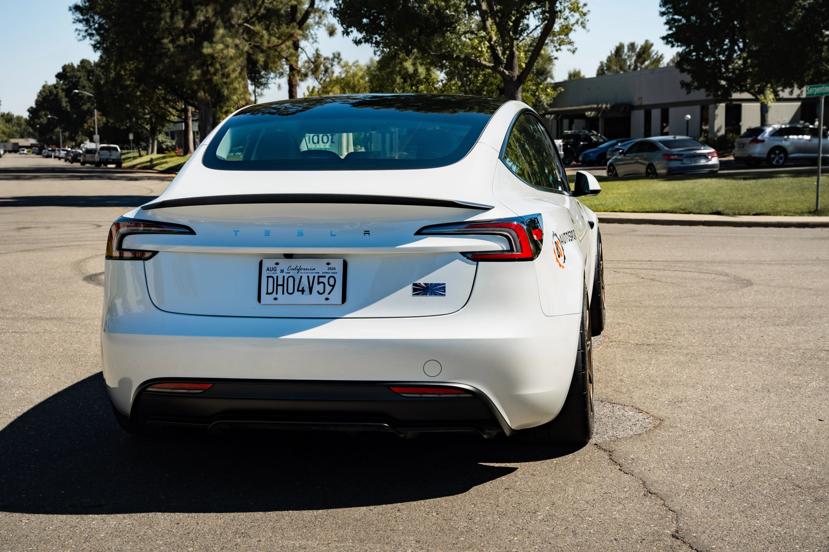 White Tesla Model 3 with 19" SM-10RS Apex wheels in Satin Bronze