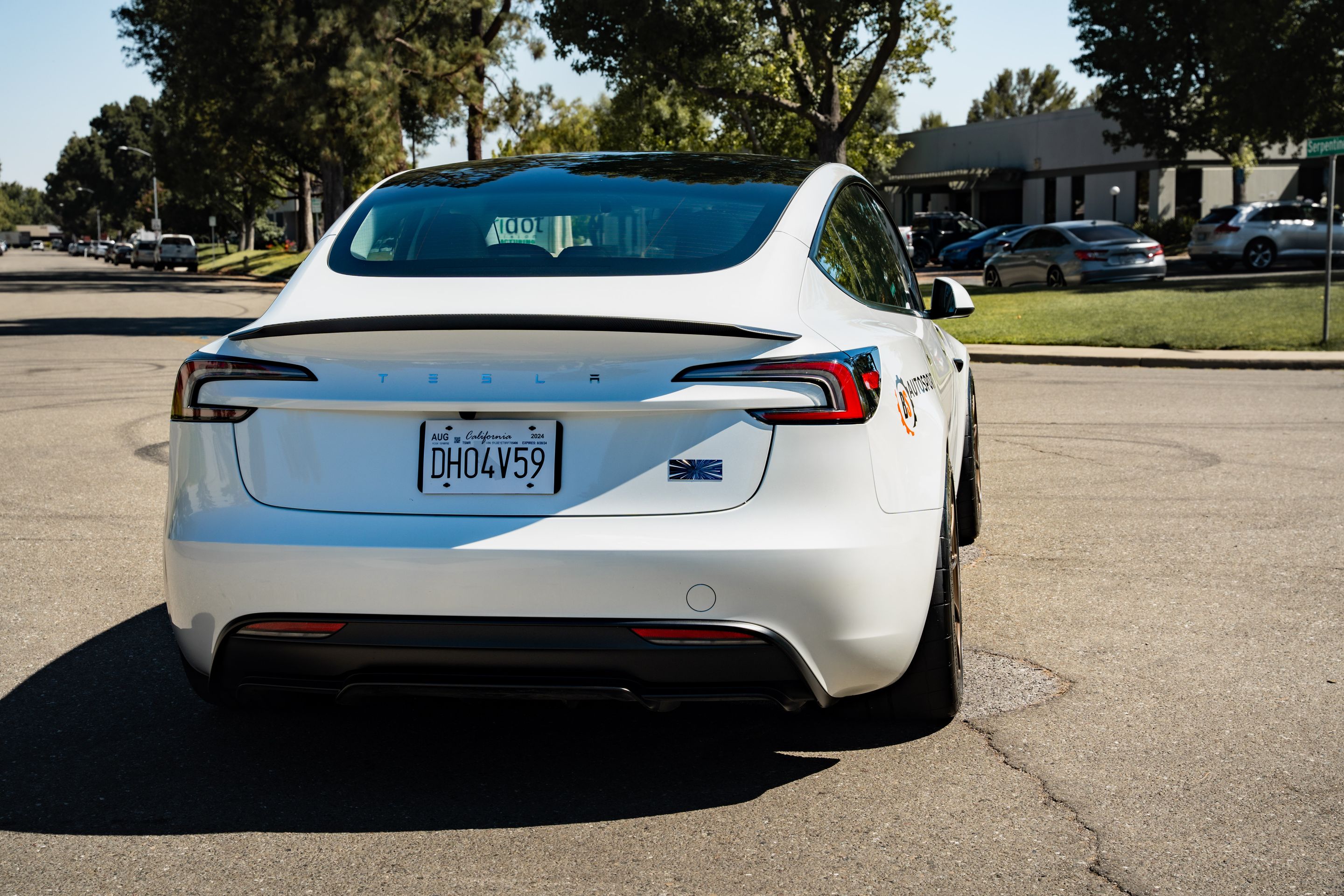 White Tesla Model 3 with 19" SM-10RS Apex wheels in Satin Bronze
