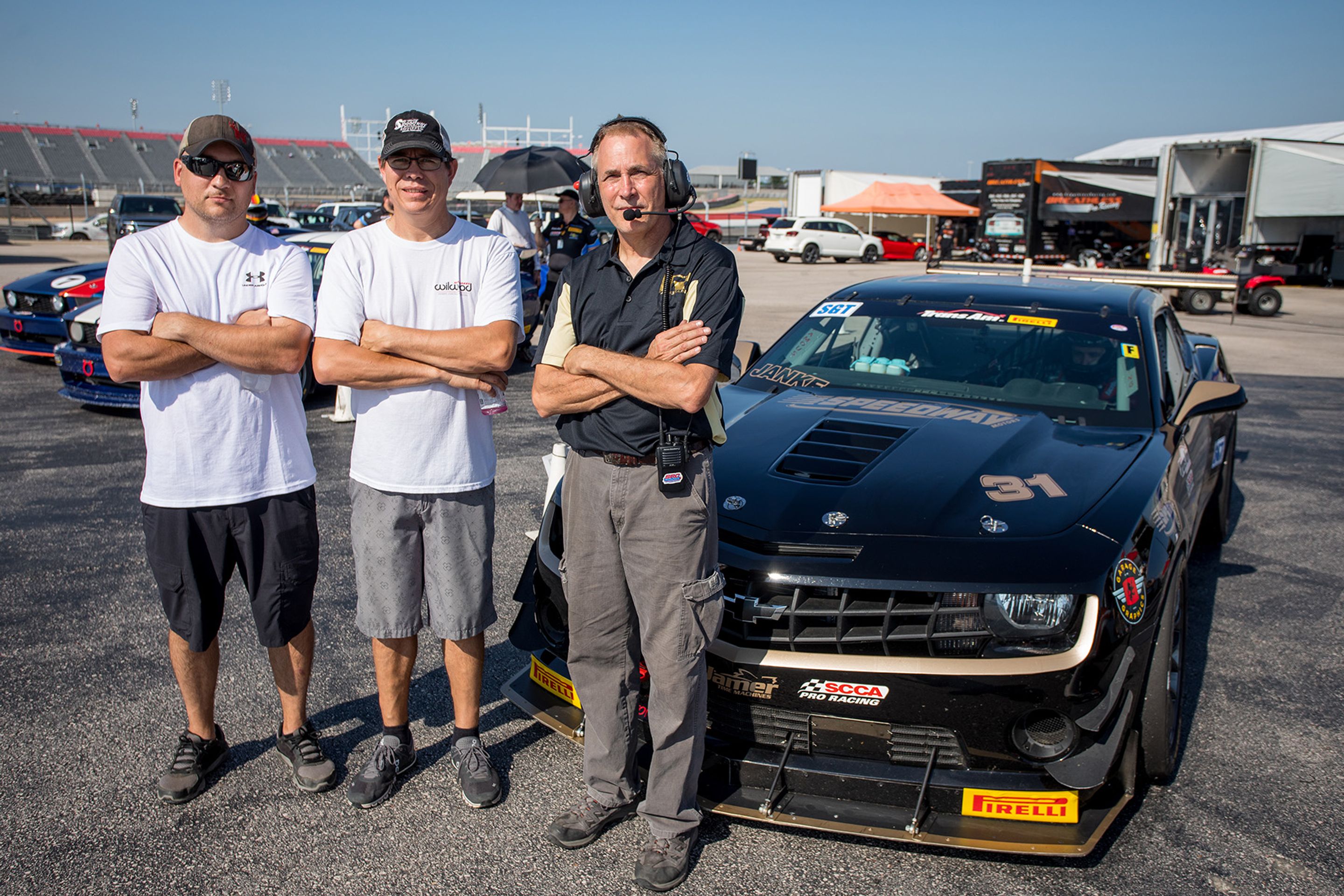 Black Chevrolet 5th Gen Camaro SS with 18" EC-7 Apex wheels in Anthracite