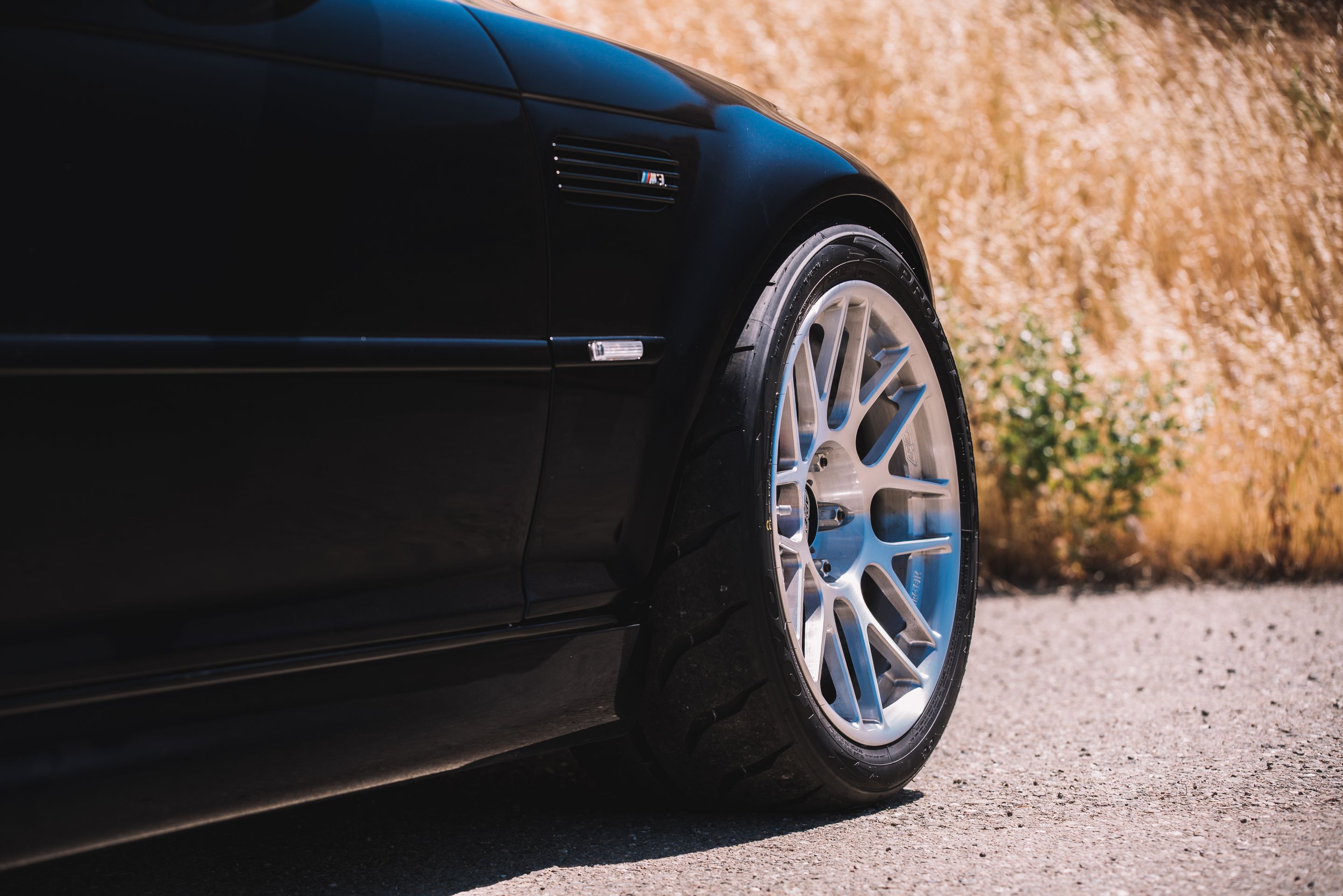 Black BMW E46 M3 with 18" ARC-8R Apex wheels in Brushed Clear