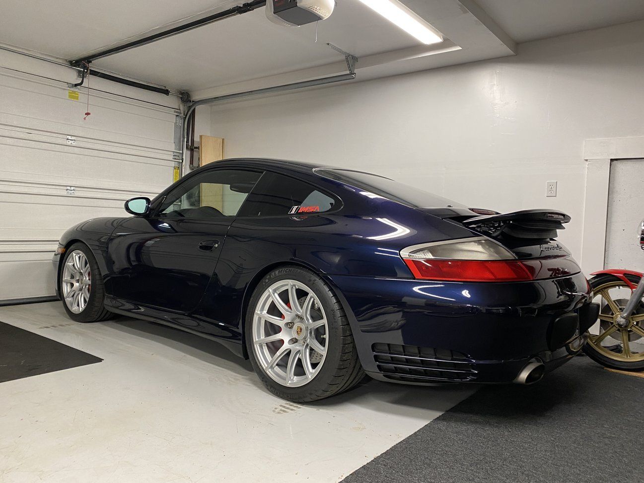 Blue Porsche 911 996 Turbo with 18" SM-10 Apex wheels in Race Silver