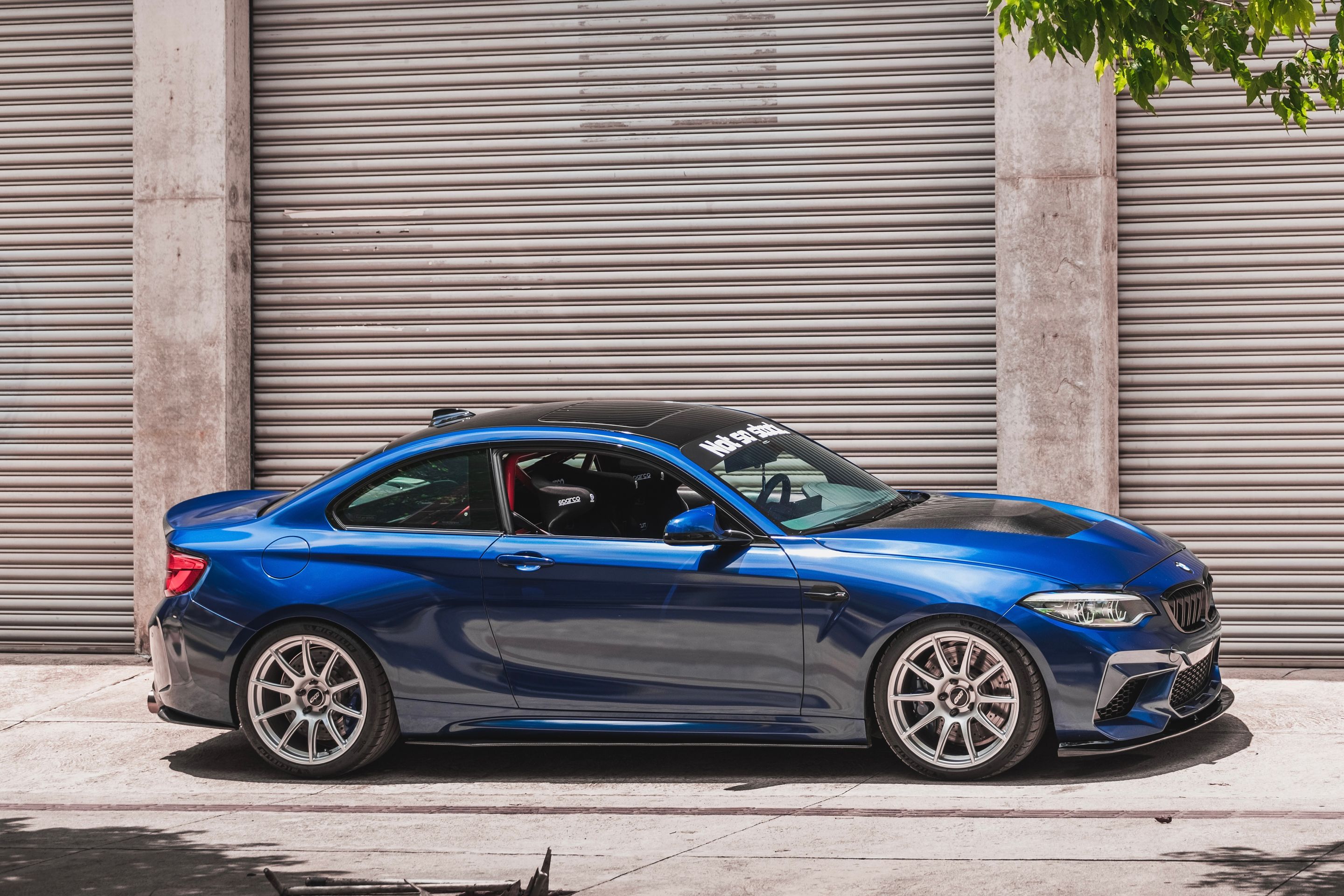 Blue BMW F87 M2 with 19" SM-10 Apex wheels in Race Silver