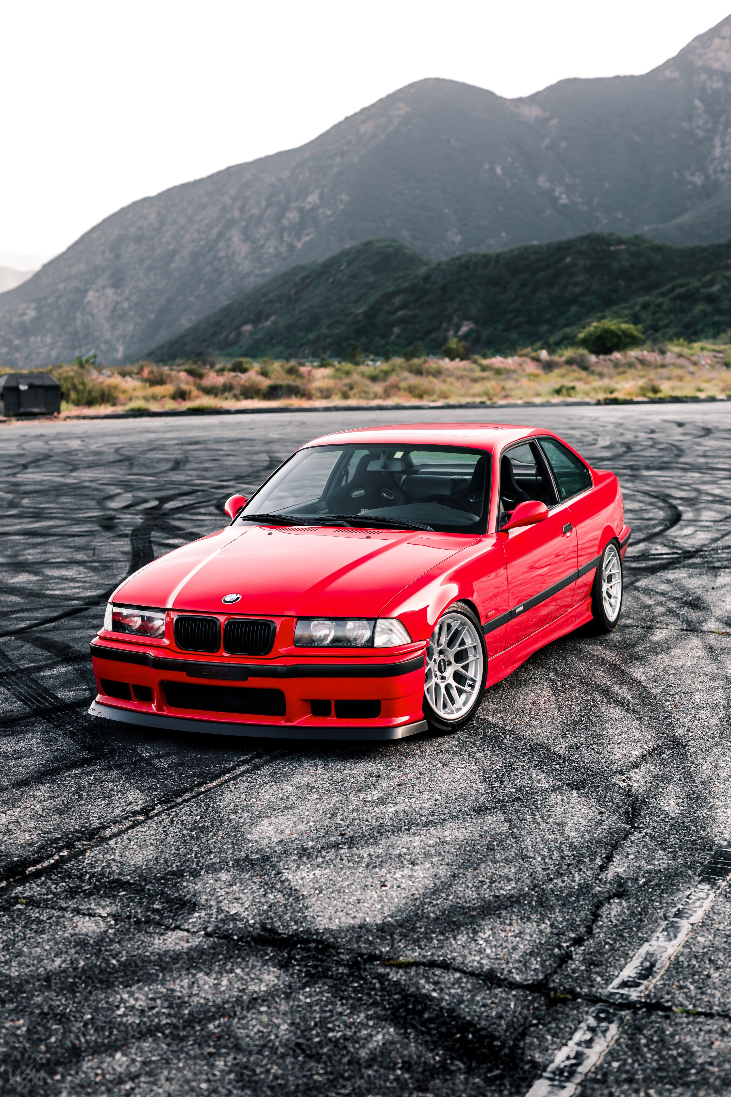 Red BMW E36 M3 with 17" ARC-8 Apex wheels in Hyper Silver