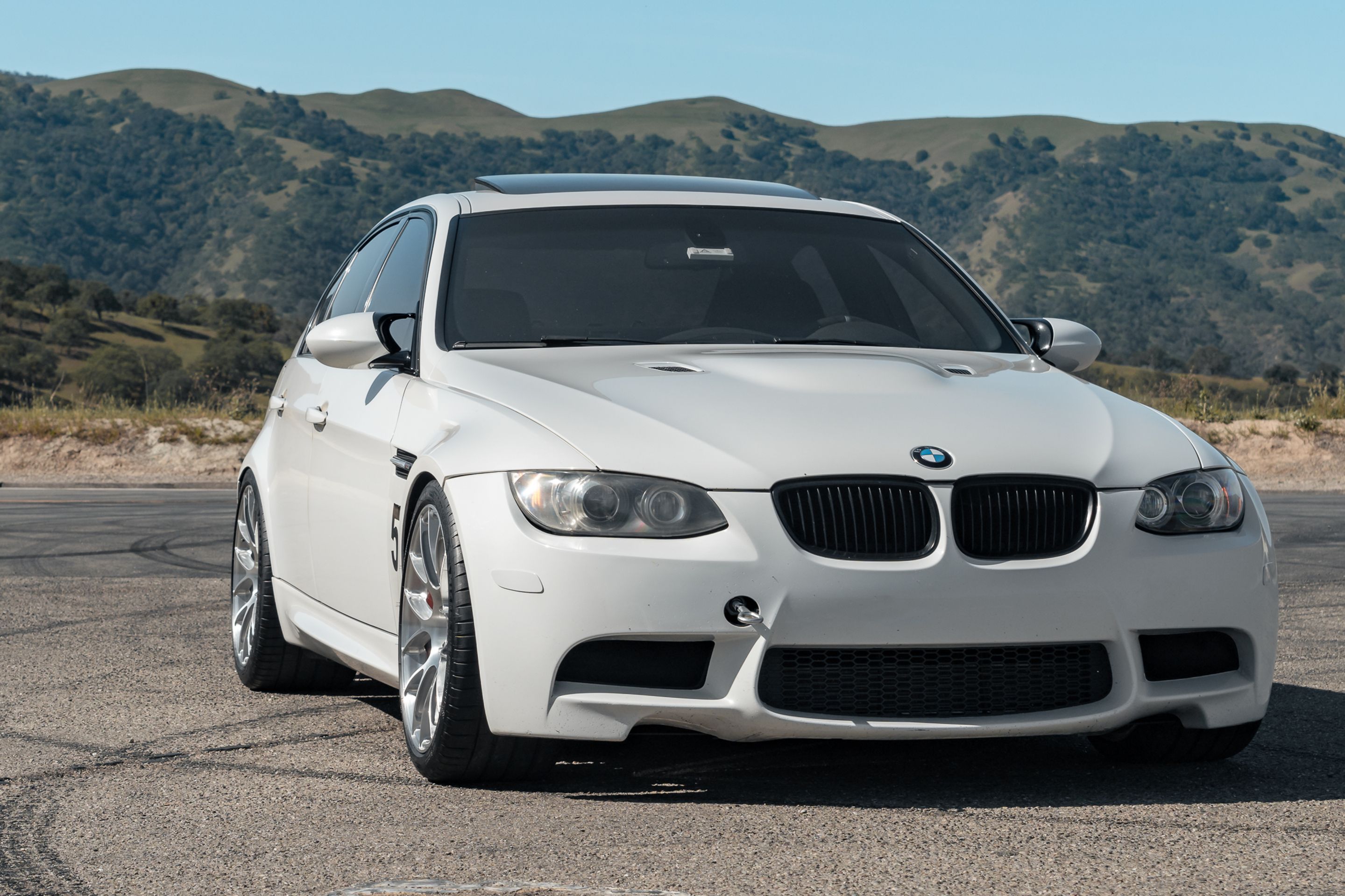 White BMW E90 Sedan M3 with 19" EC-7RS Apex wheels in Brushed Clear