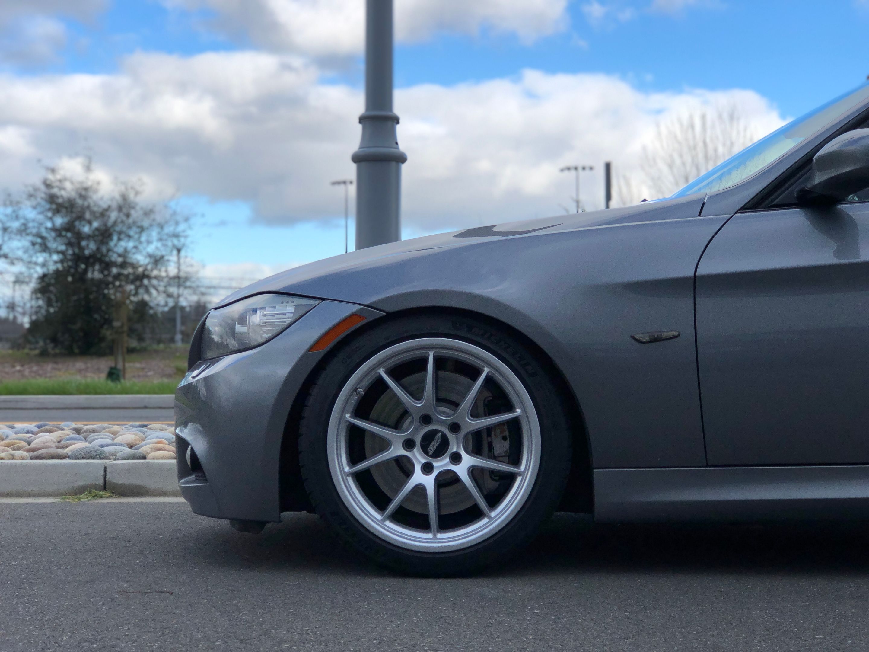 Grey BMW E90 LCI Sedan 3 Series with 18" FL-5 Apex wheels in Race Silver