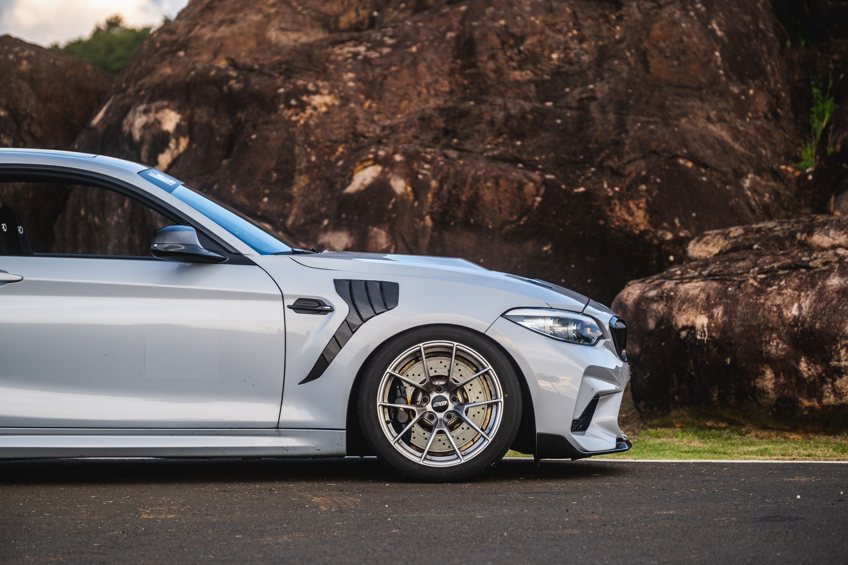 Silver BMW F87 M2 with 18" VS-5RS Apex wheels in Brushed Clear