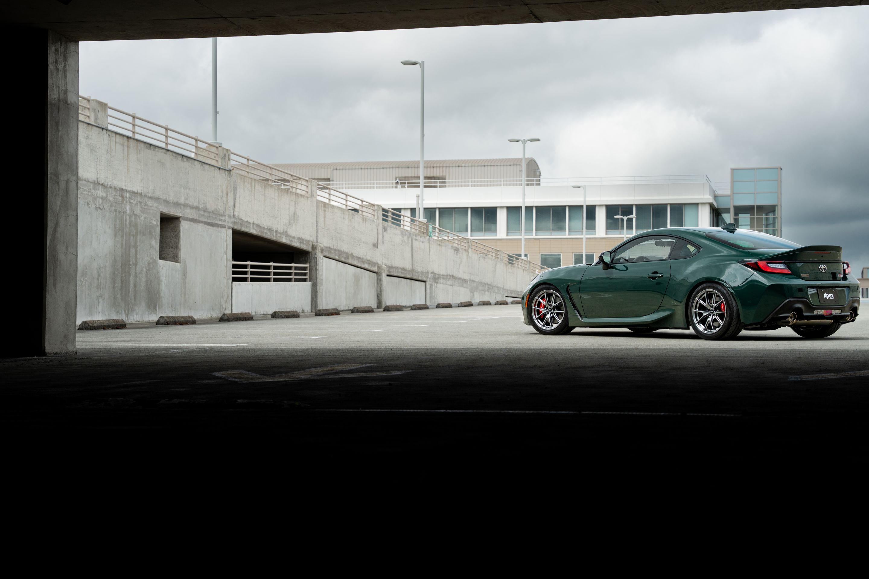 Green Toyota GR86 with 17" VS-5 Apex wheels in Hyper Black