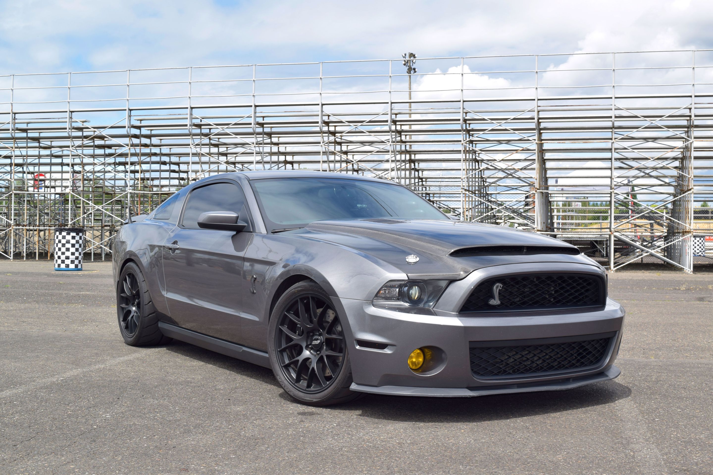 Grey Ford S197 Mustang GT500 with 19" EC-7 Apex wheels in Satin Black