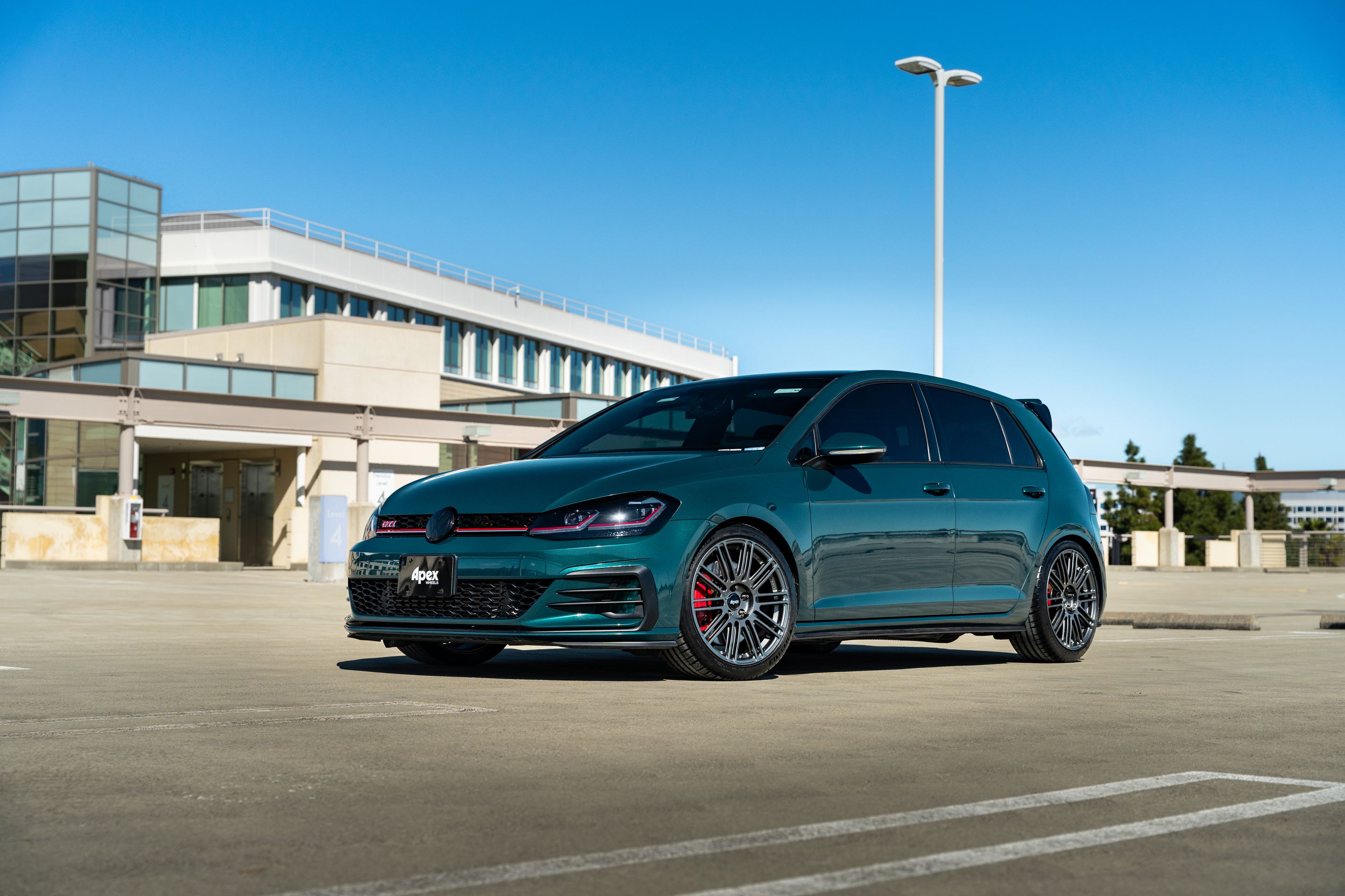 Green VW MK7 GTI with 18" TC-10RT Apex wheels in Anthracite
