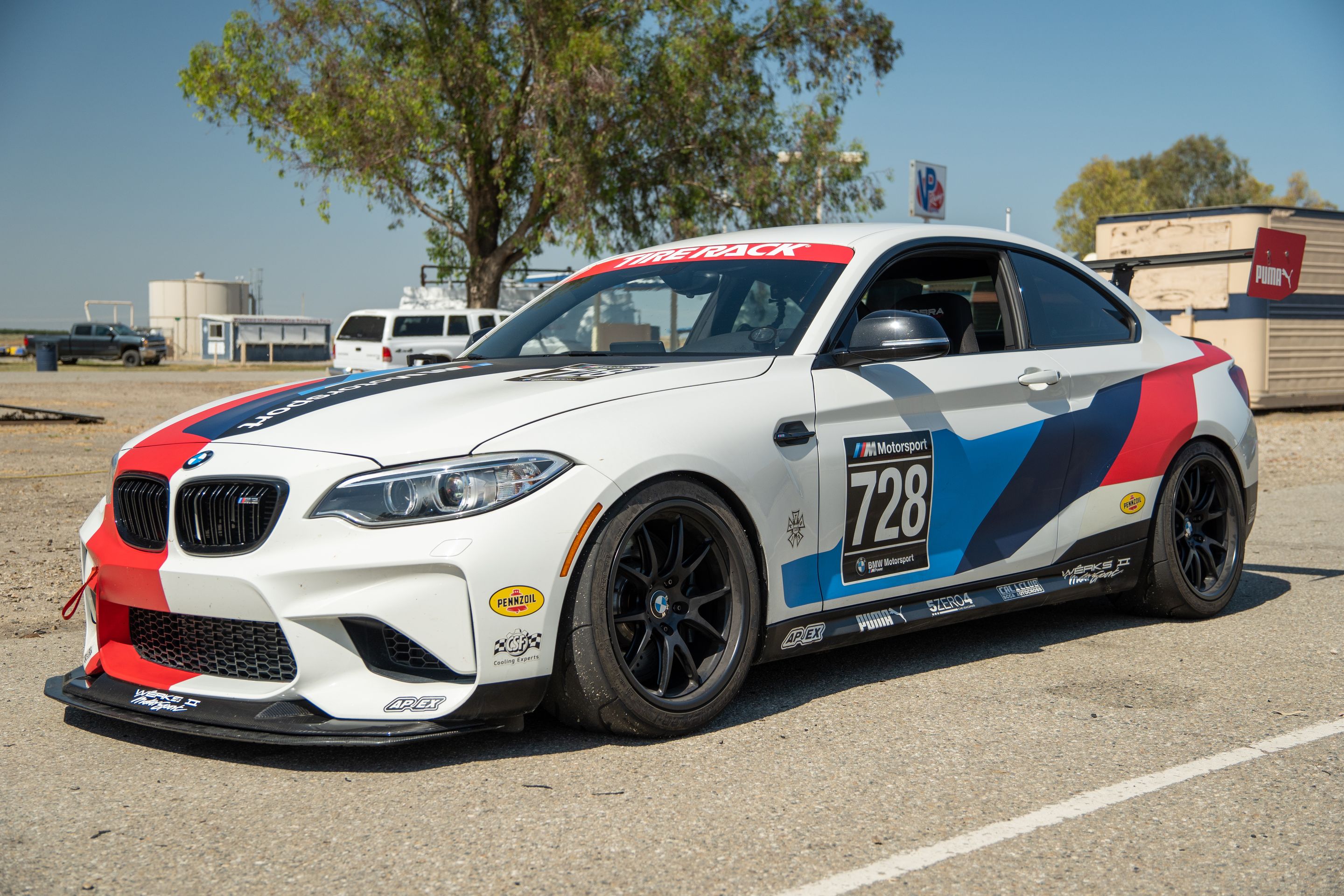 White BMW F87 M2 with 18" FL-5 Apex wheels in Satin Black