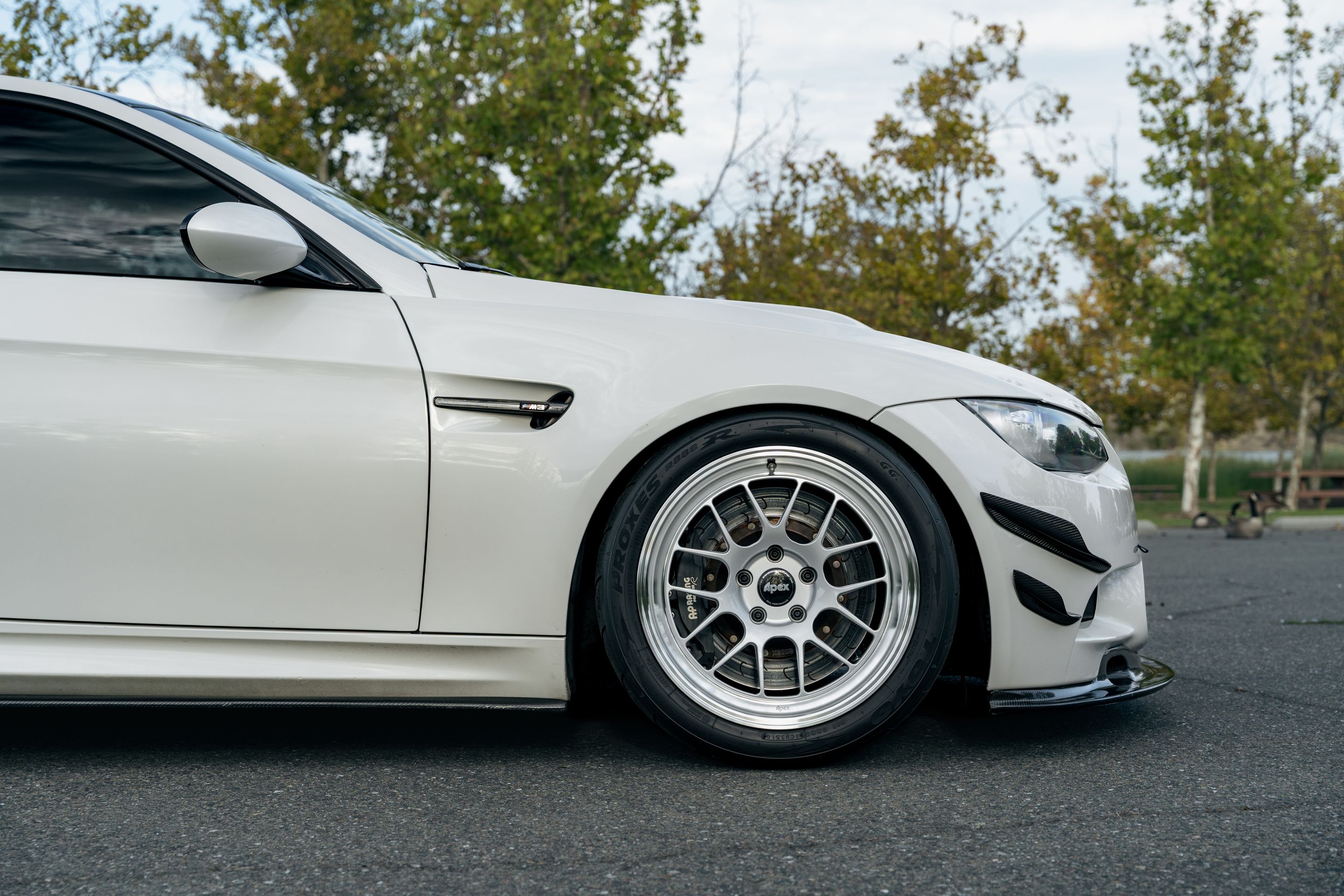 White BMW E92 Coupe M3 with 18" ML-7RT Apex wheels in Machined Lip Race Silver
