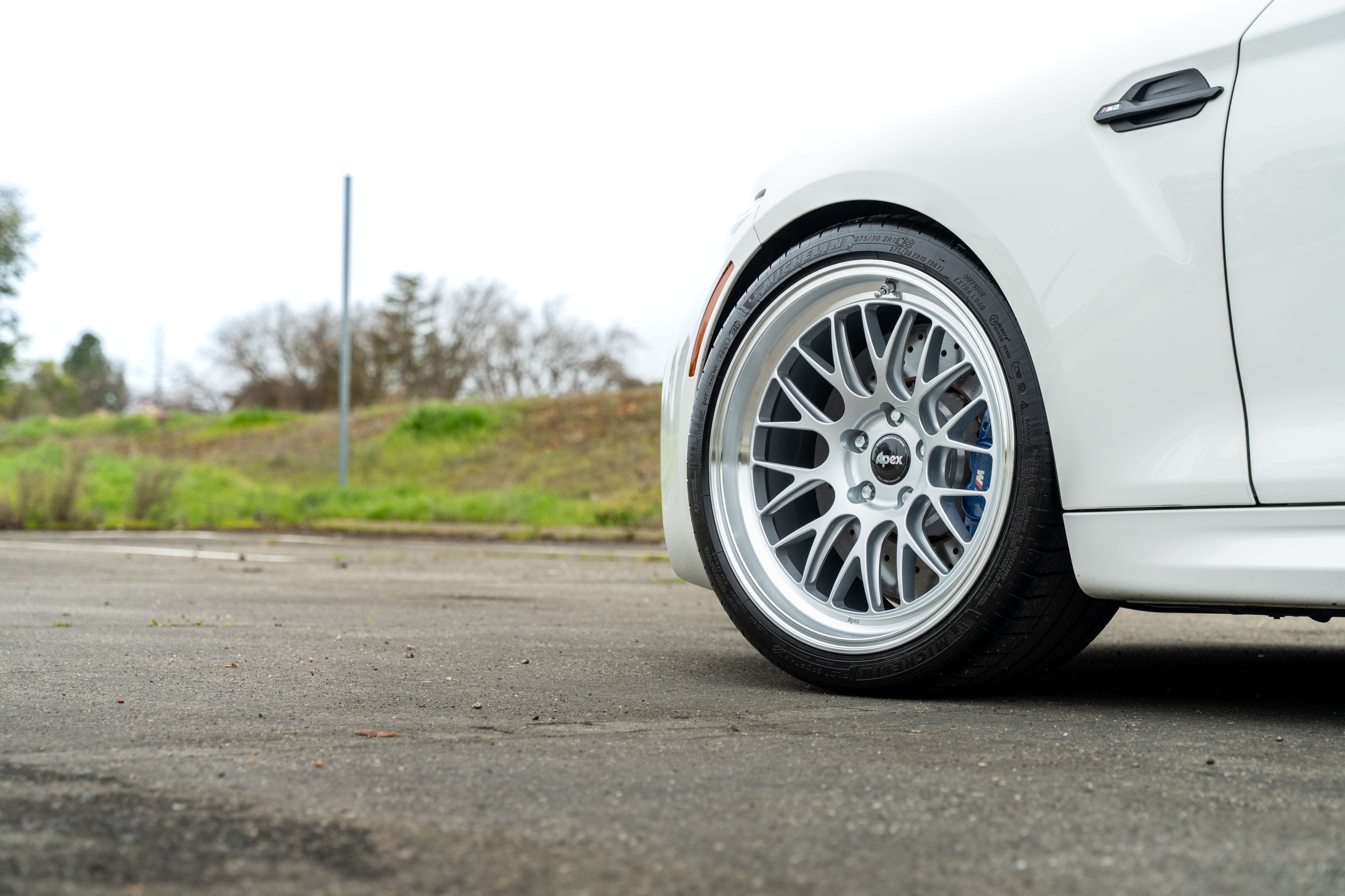 White BMW F87 M2 with 19" ML-10RT Apex wheels in Machined Lip Race Silver