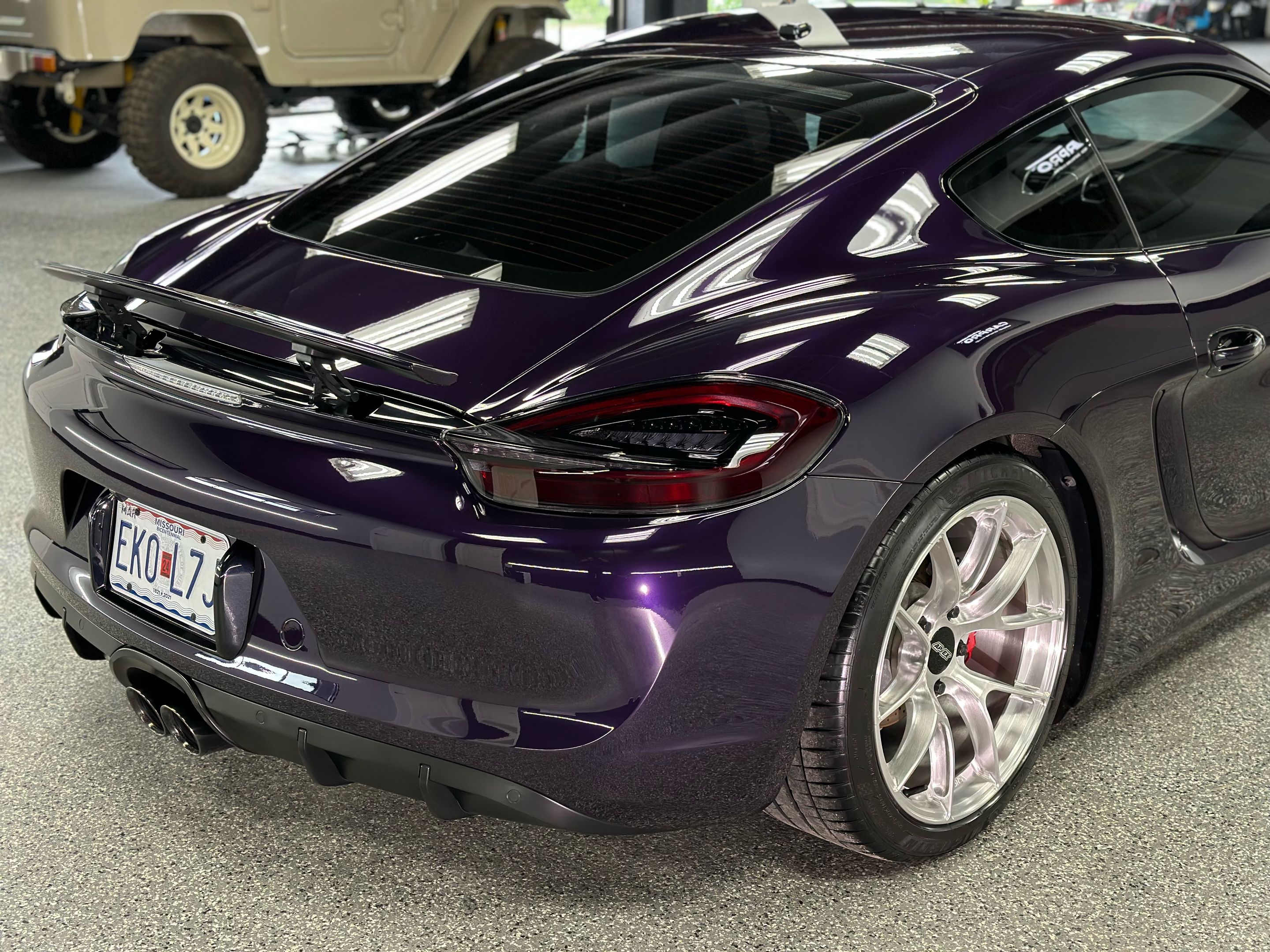 Purple Porsche 981 Cayman GTS with 19" VS-5RS Apex wheels in Brushed Clear