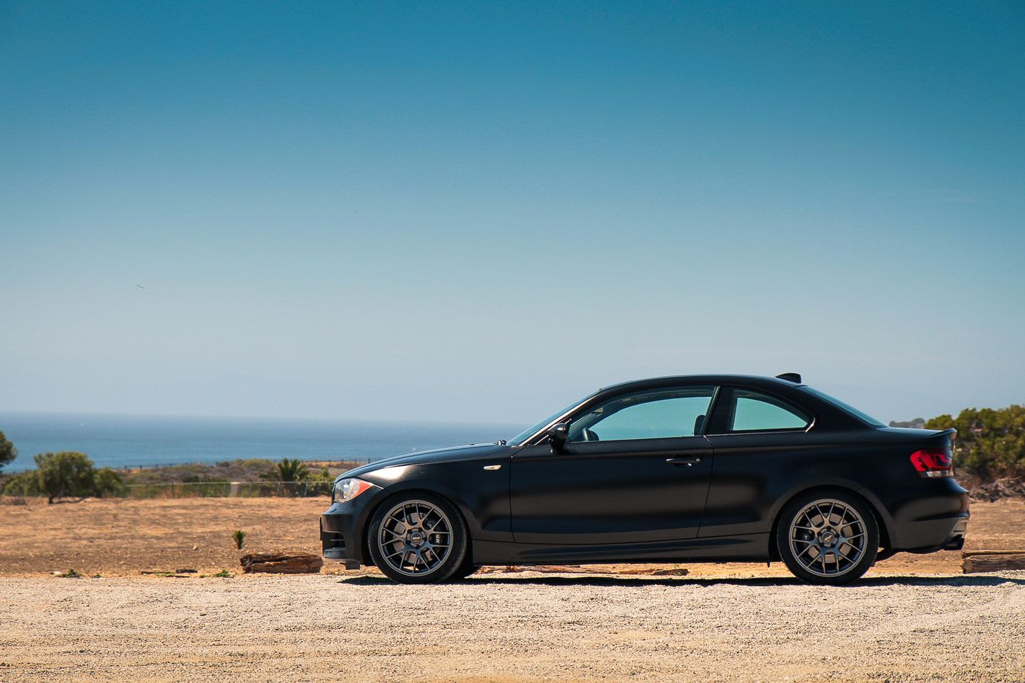 Black BMW E82 Coupe 1 Series with 18" EC-7 Apex wheels in Anthracite