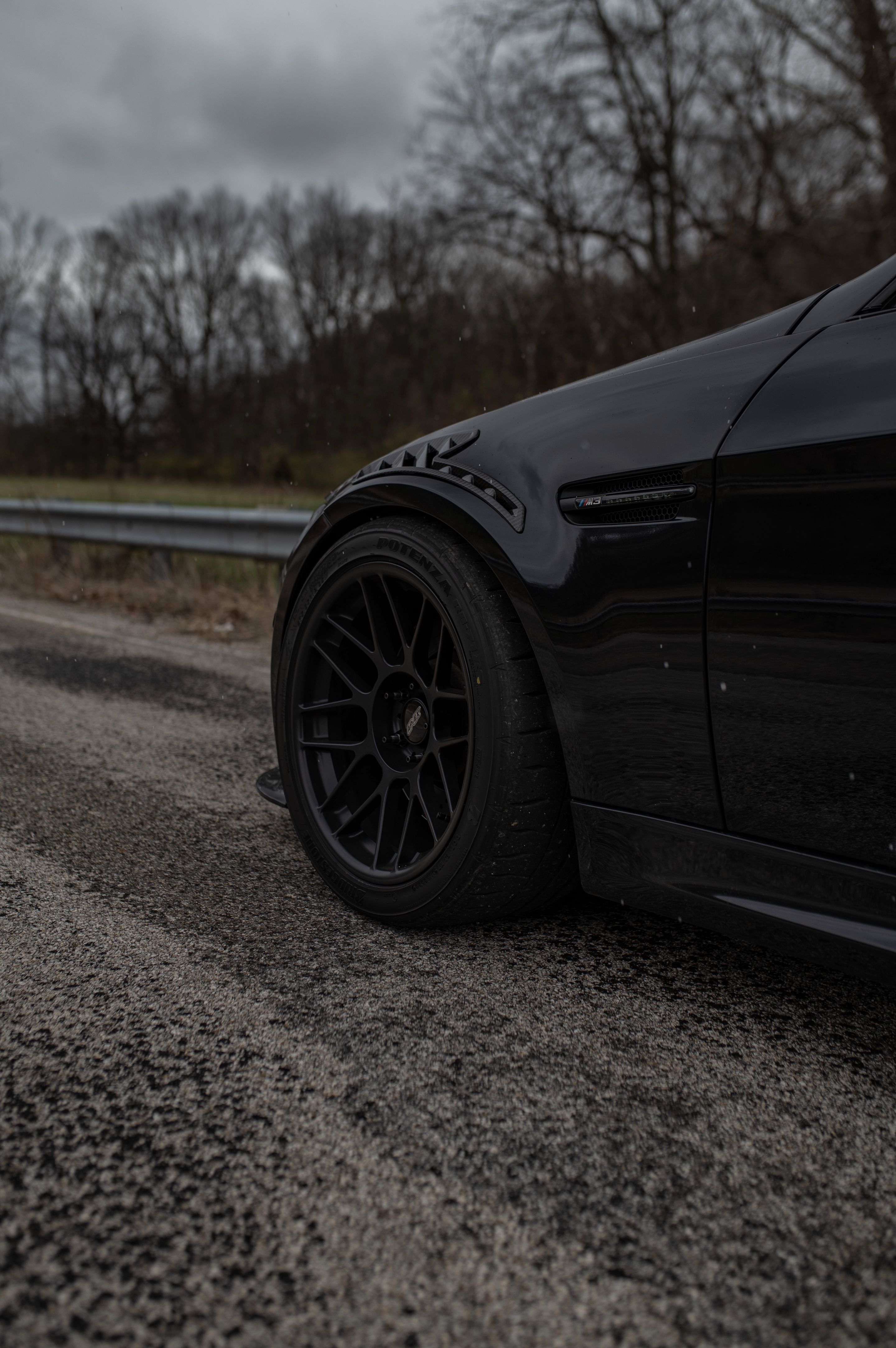 Black BMW E90 Sedan M3 with 18" ARC-8 Apex wheels in Satin Black