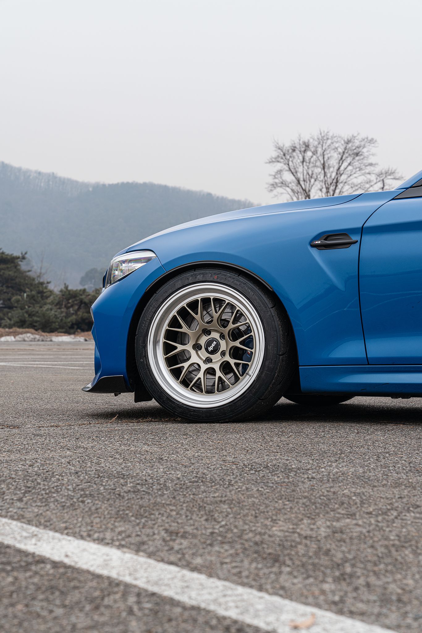Blue BMW F87 M2 with 18" ML-10RT Apex wheels in Machined Lip Gloss Motorsport Gold