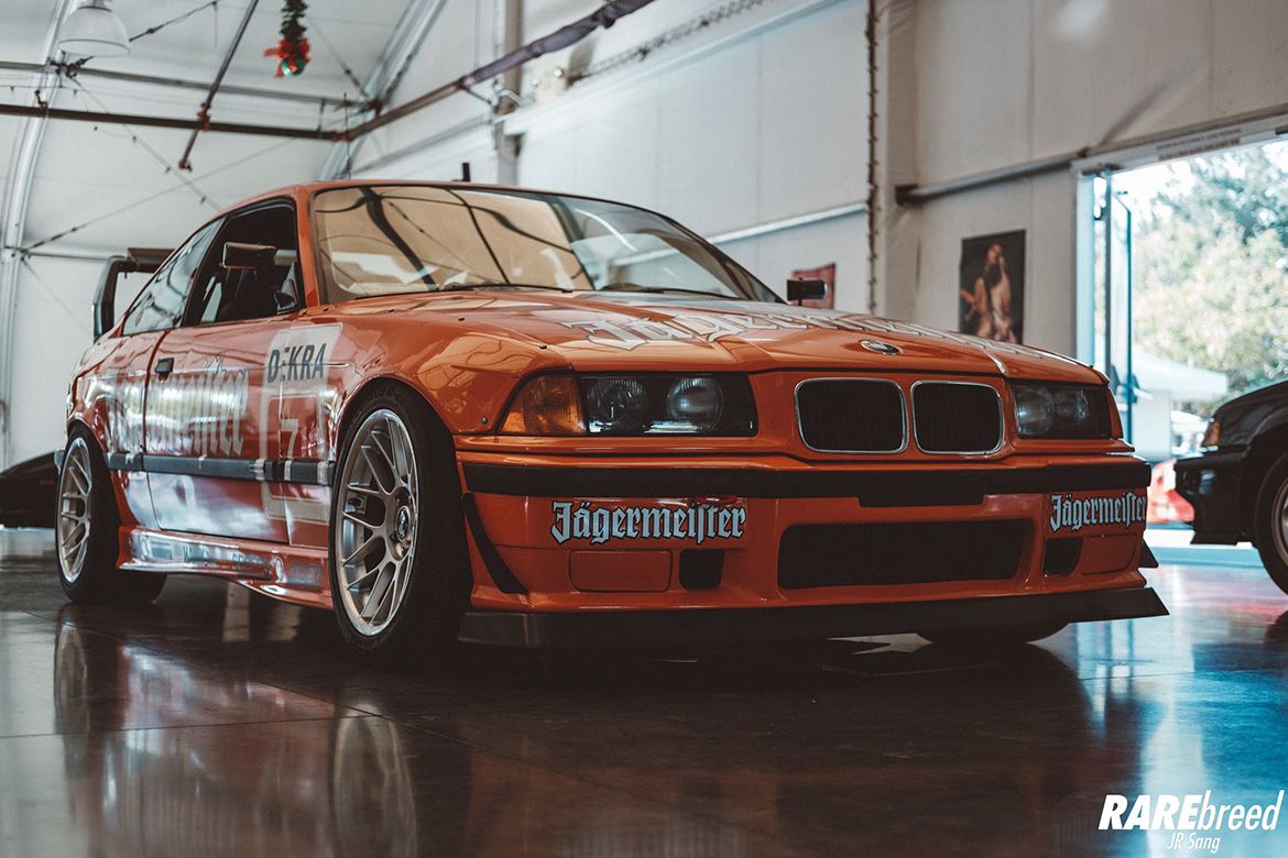 Orange BMW E36 3 Series with 17" ARC-8 Apex wheels in Hyper Silver