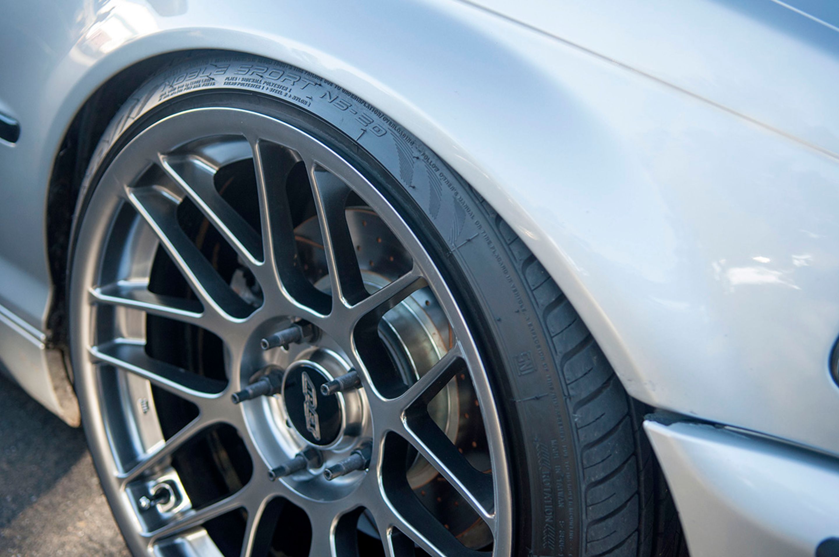 Black Chevrolet 6th Gen Camaro SS with 19" ARC-8 Apex wheels in Satin Black