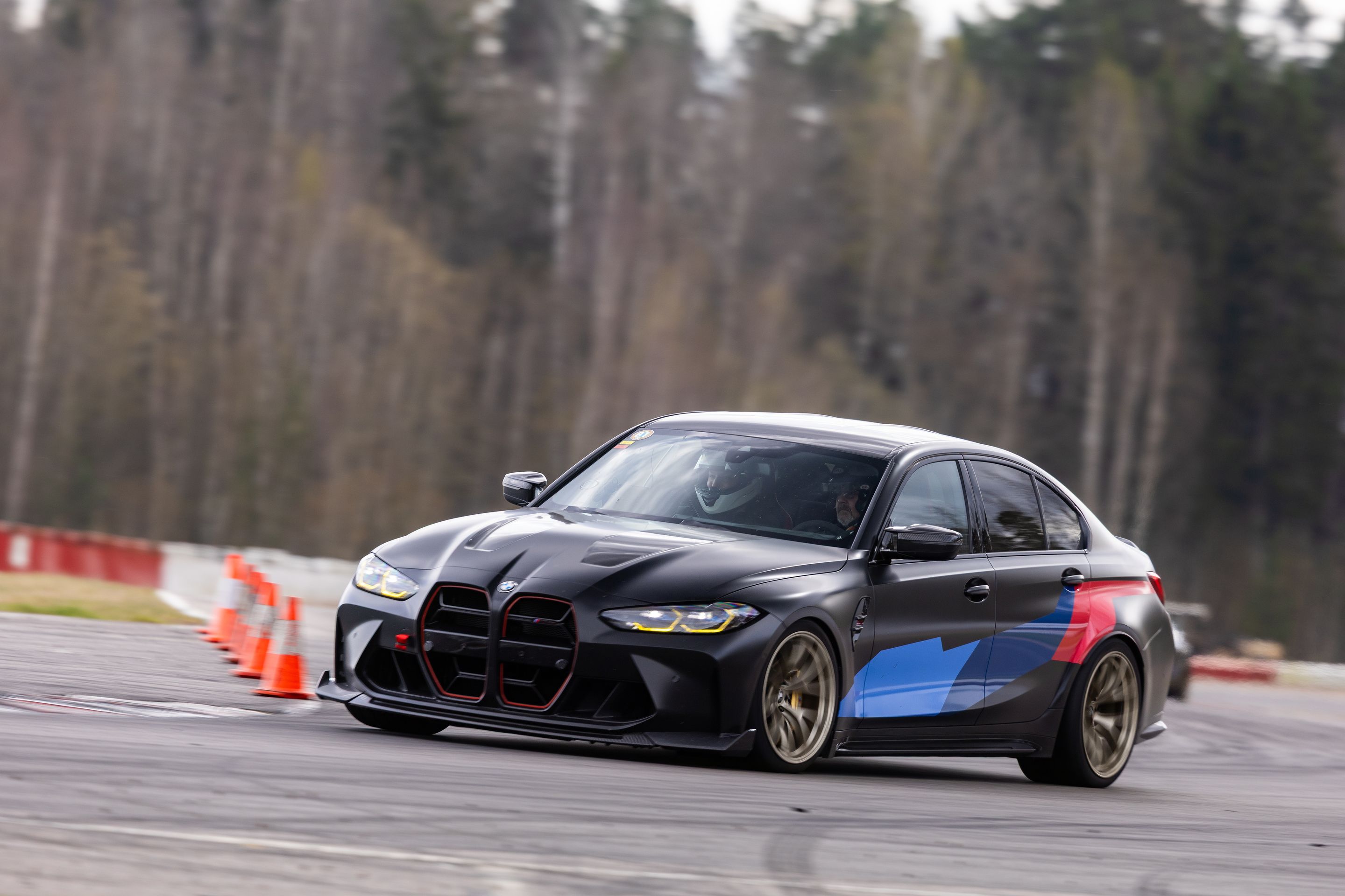 Black BMW G80 M3 with 19" VS-5RS Apex wheels in Motorsport Gold