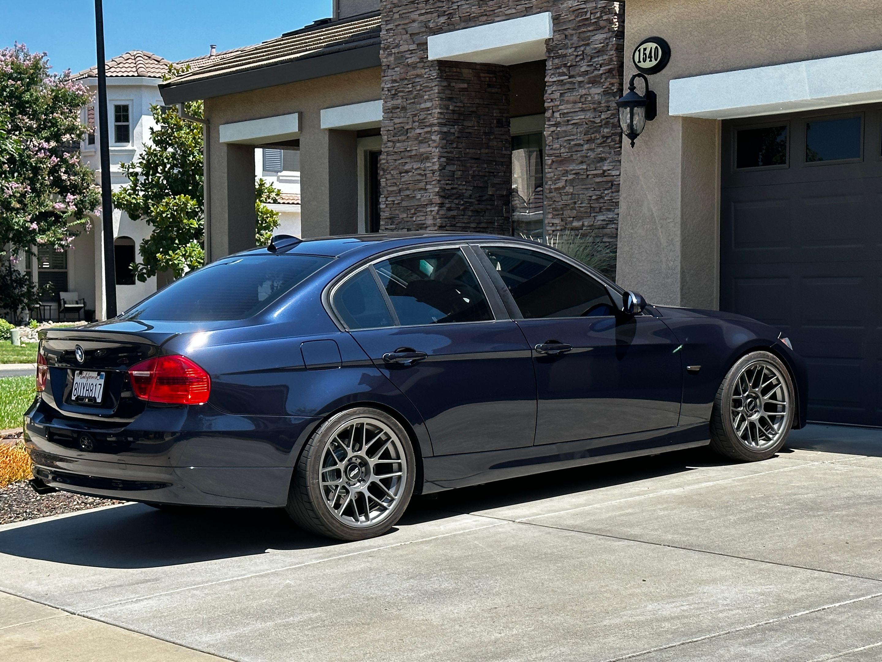 Black BMW E90 Sedan 3 Series with 18" ARC-8 Apex wheels in Anthracite