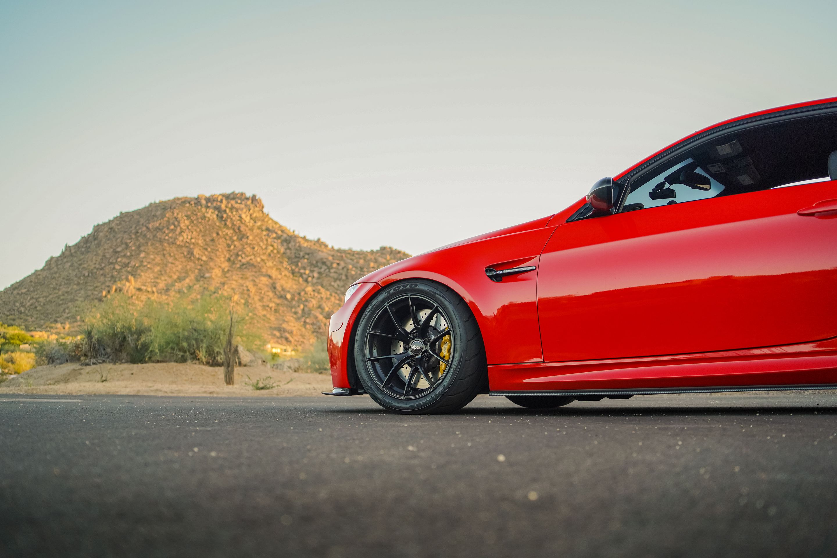 Red BMW E92 Coupe M3 with 18" VS-5RS Apex wheels in Satin Black