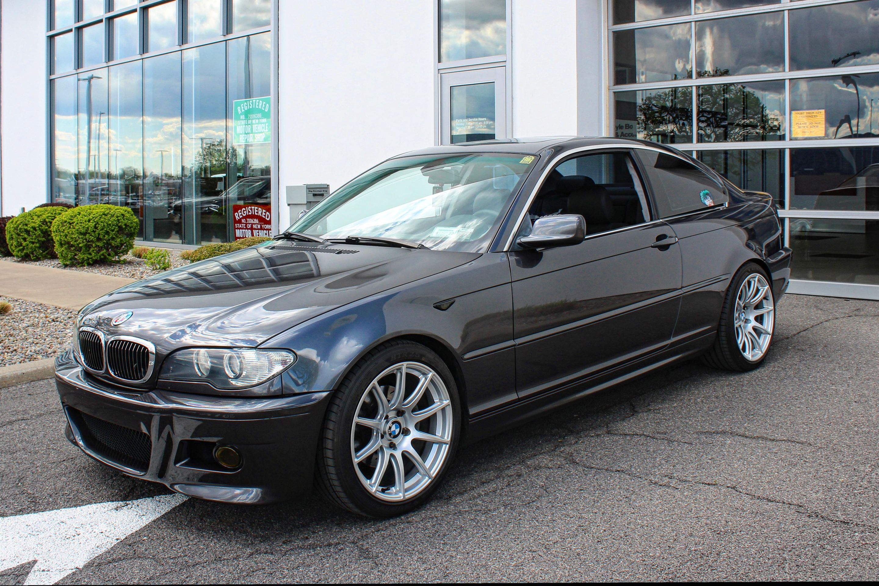 Black BMW E46 3 Series with 18" SM-10 Apex wheels in Race Silver