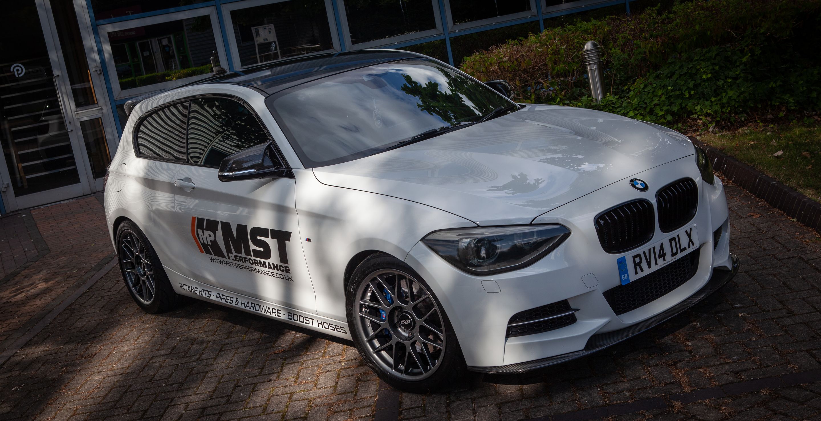 White BMW F21 3 Door Hatchback 1 Series with 18" ARC-8 Apex wheels in Anthracite
