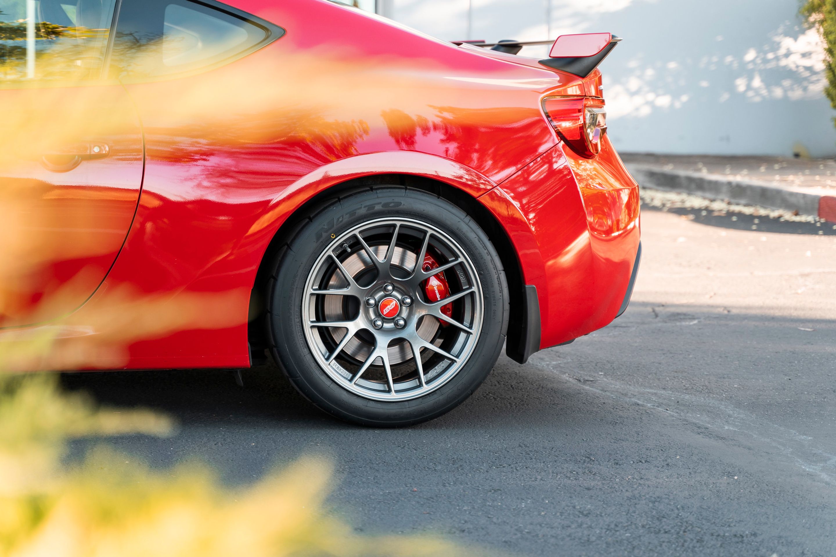 Red Subaru ZC6 / Gen 1 BRZ with 17" EC-7R Apex wheels in Anthracite