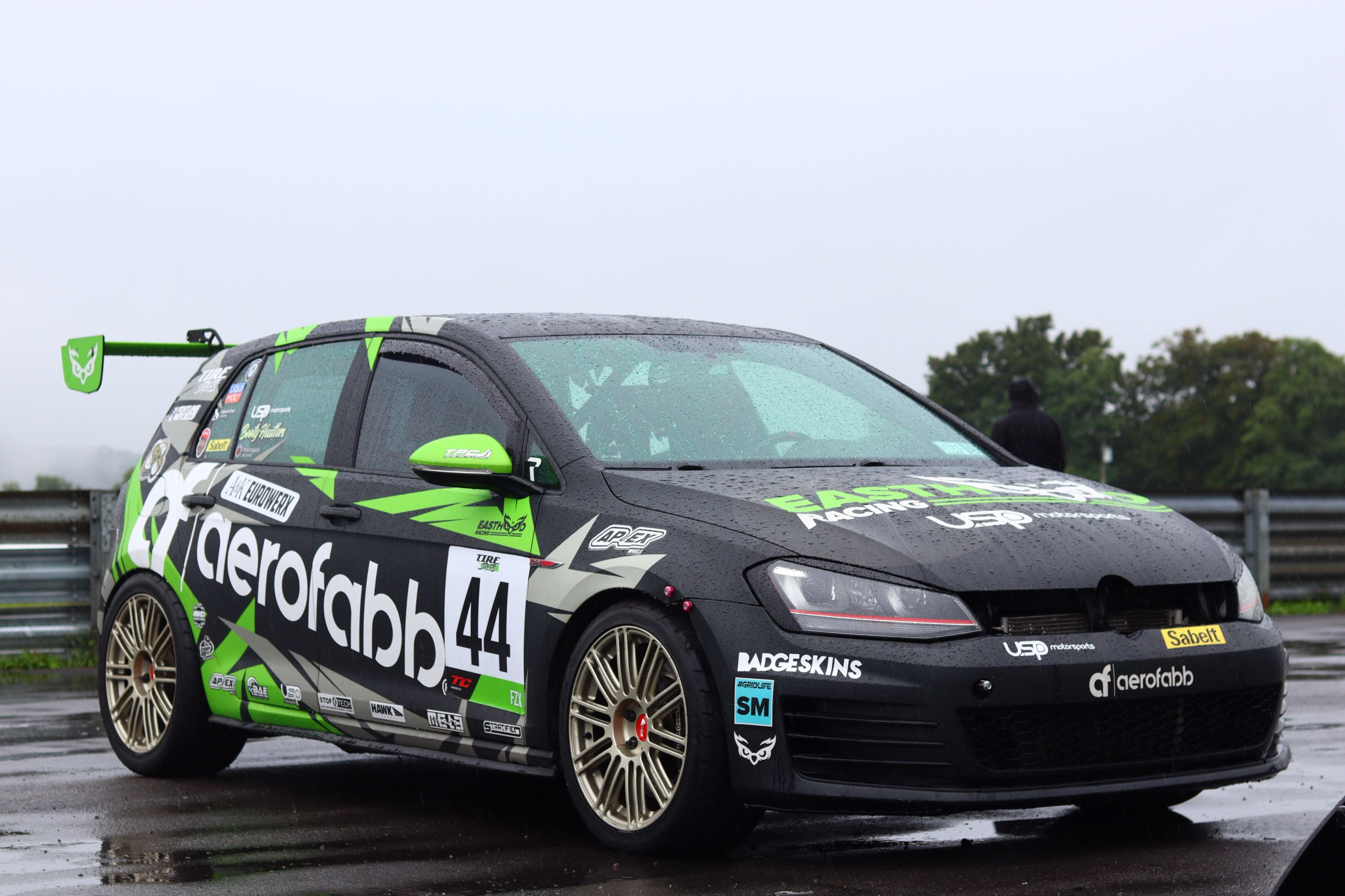 Race Livery VW MK7 GTI with 18" TC-10RT Apex wheels in Motorsport Gold