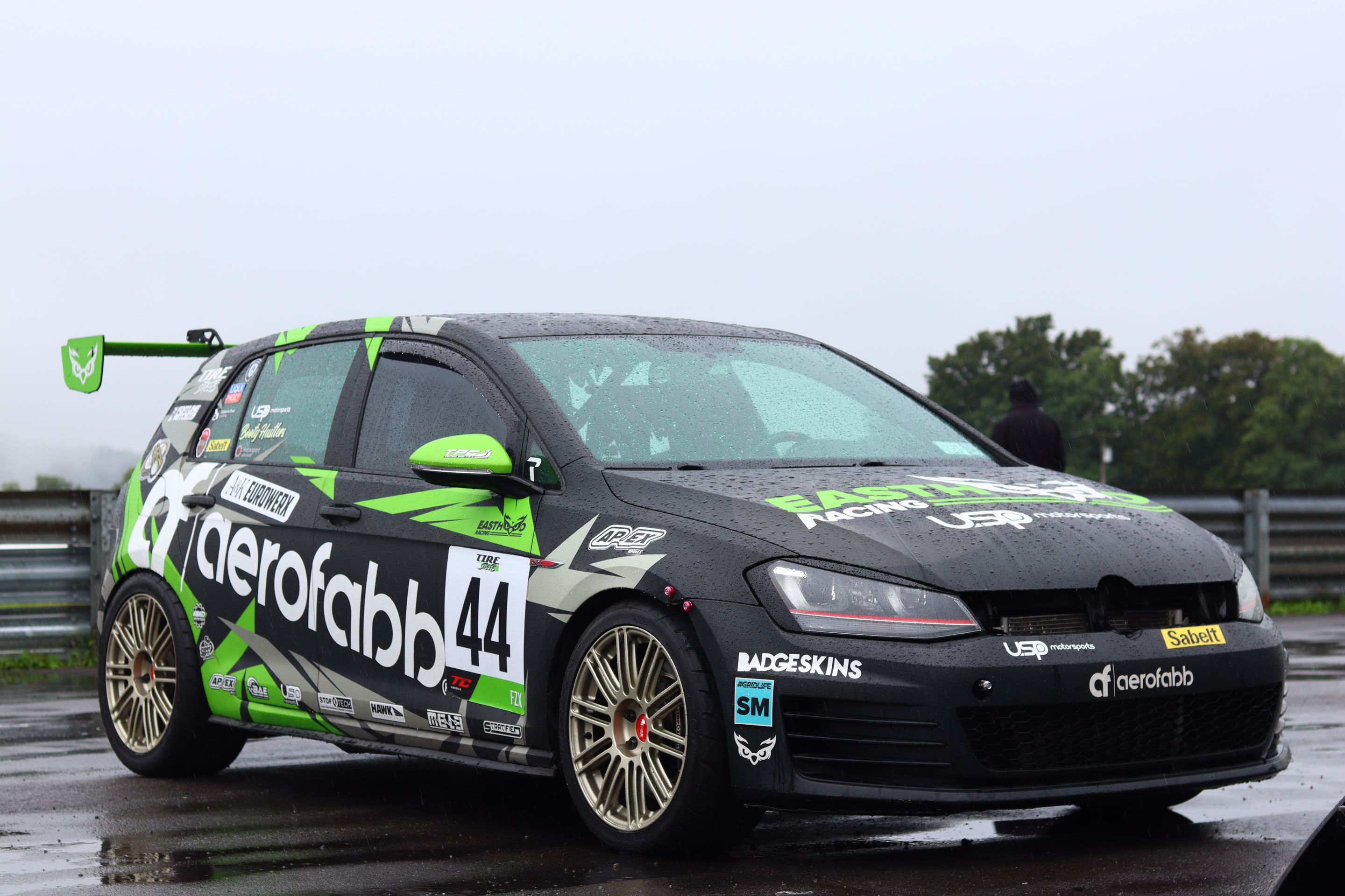 Race Livery VW MK7 GTI with 18" TC-10RT Apex wheels in Motorsport Gold