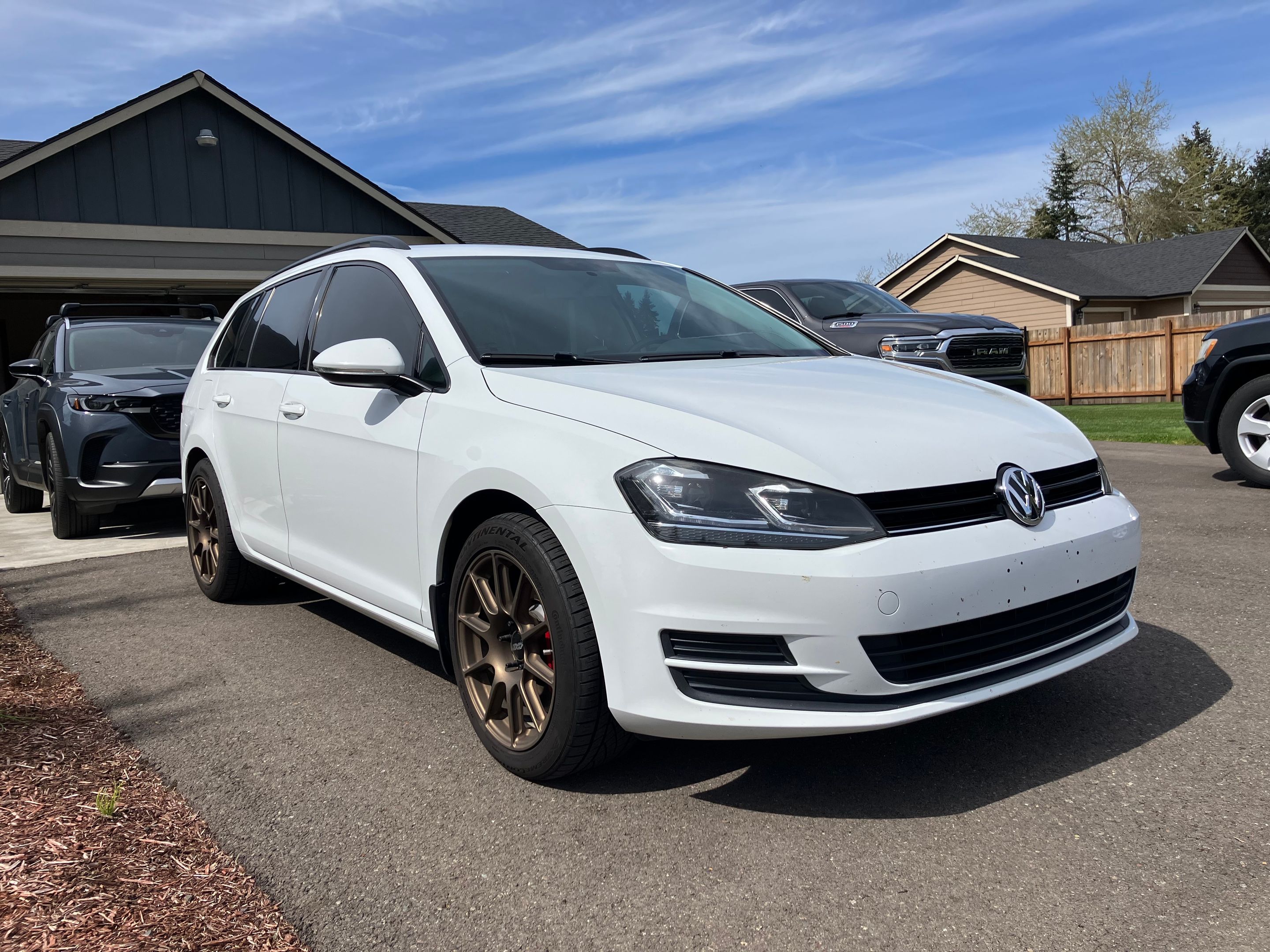 White VW MK7 Alltrack/SportWagen Golf SportWagen with 17" VS-5 Apex wheels in Satin Bronze