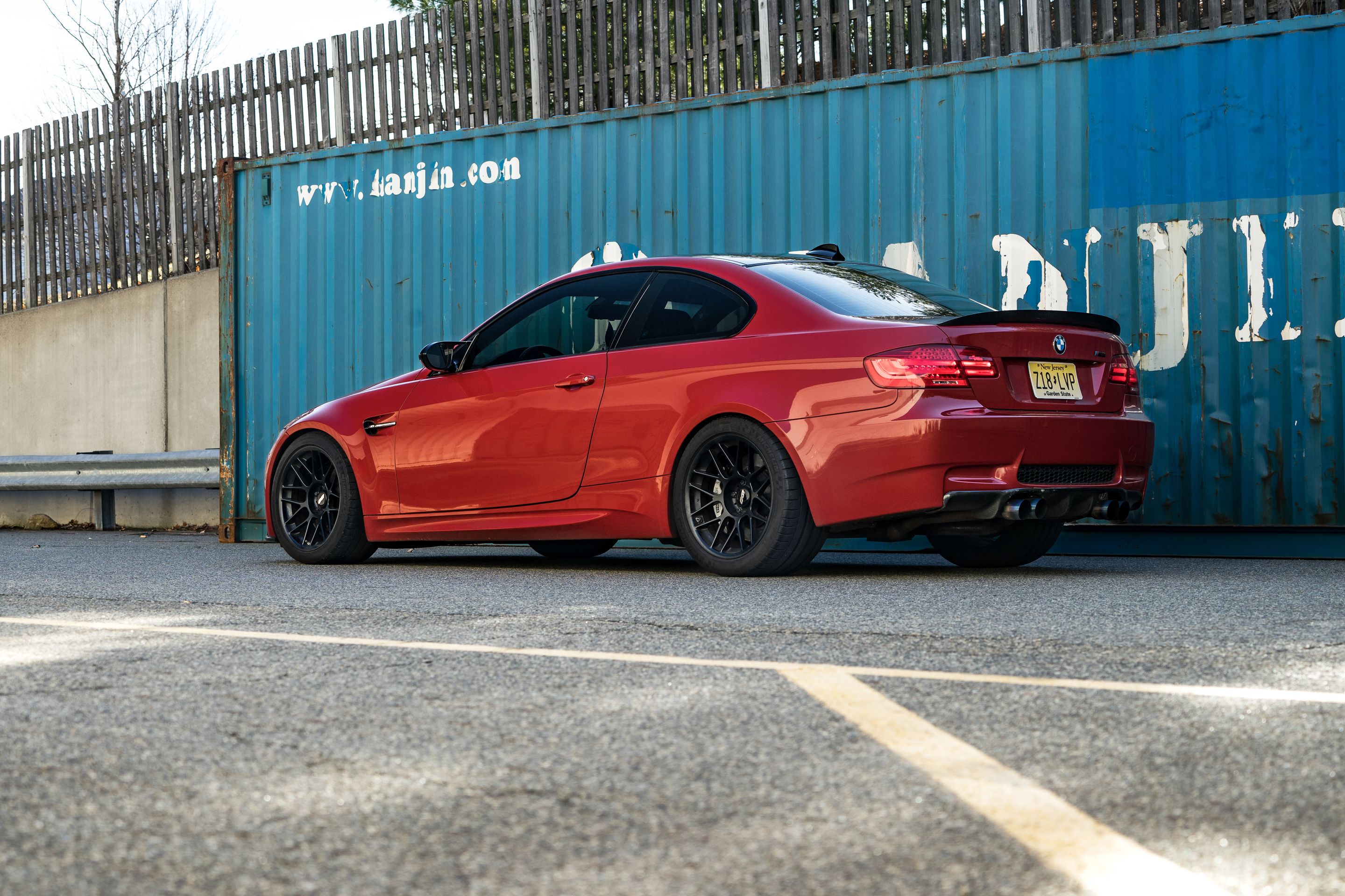 Red BMW E92 Coupe M3 with 18" ARC-8 Apex wheels in Satin Black