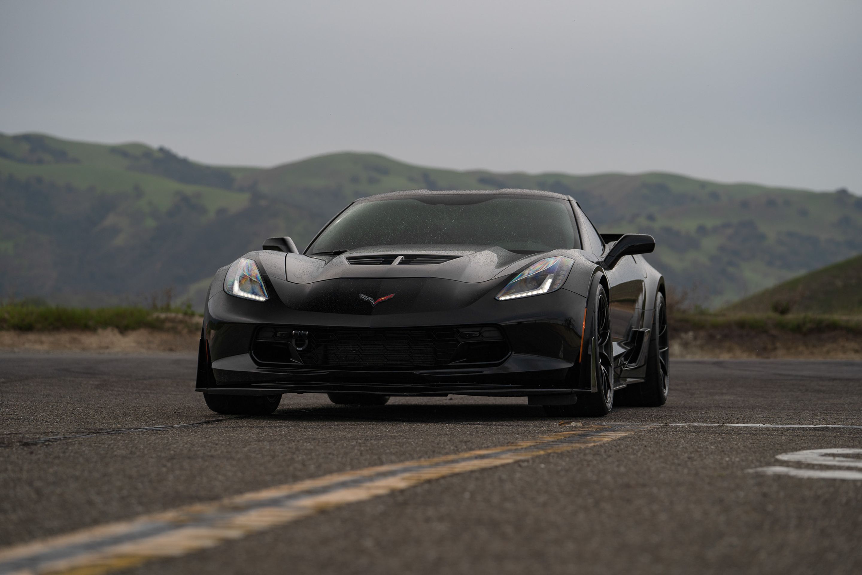 Black Chevrolet C7 Corvette Z06 with 19" VS-5RS Apex wheels in Satin Black