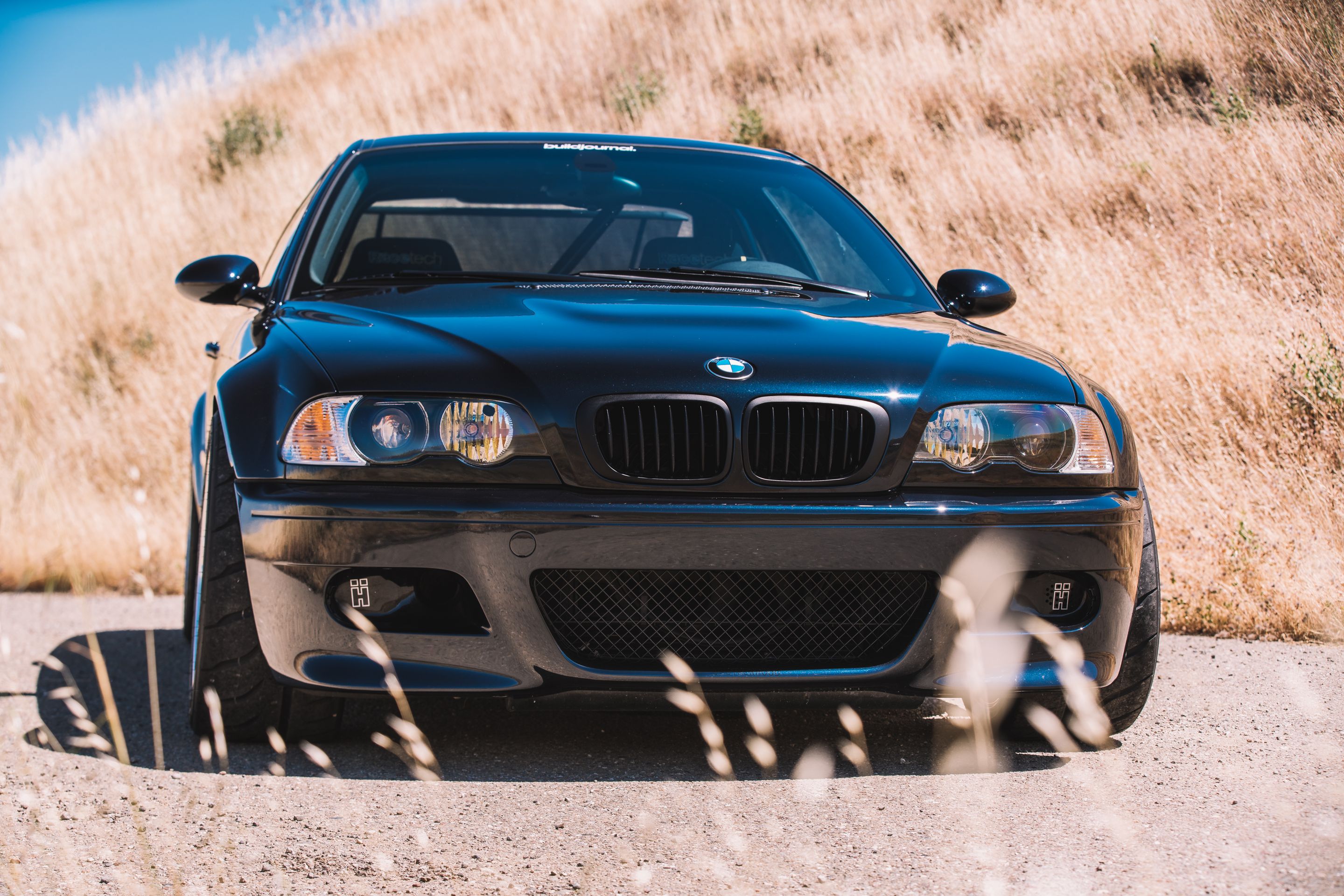 Black BMW E46 M3 with 18" ARC-8R Apex wheels in Brushed Clear