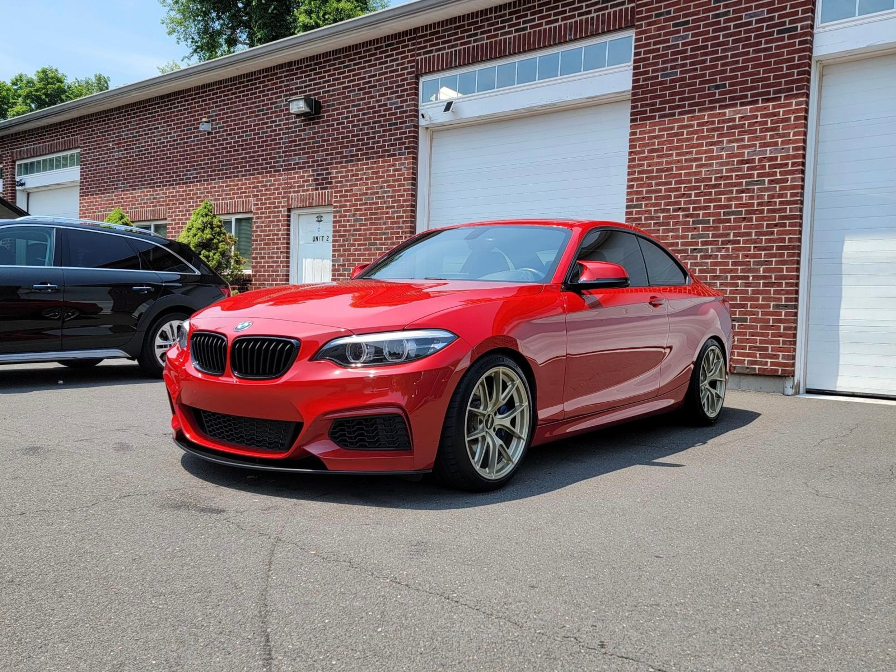 Red BMW F22 Coupe 2 Series with 18" VS-5RS Apex wheels in Motorsport Gold