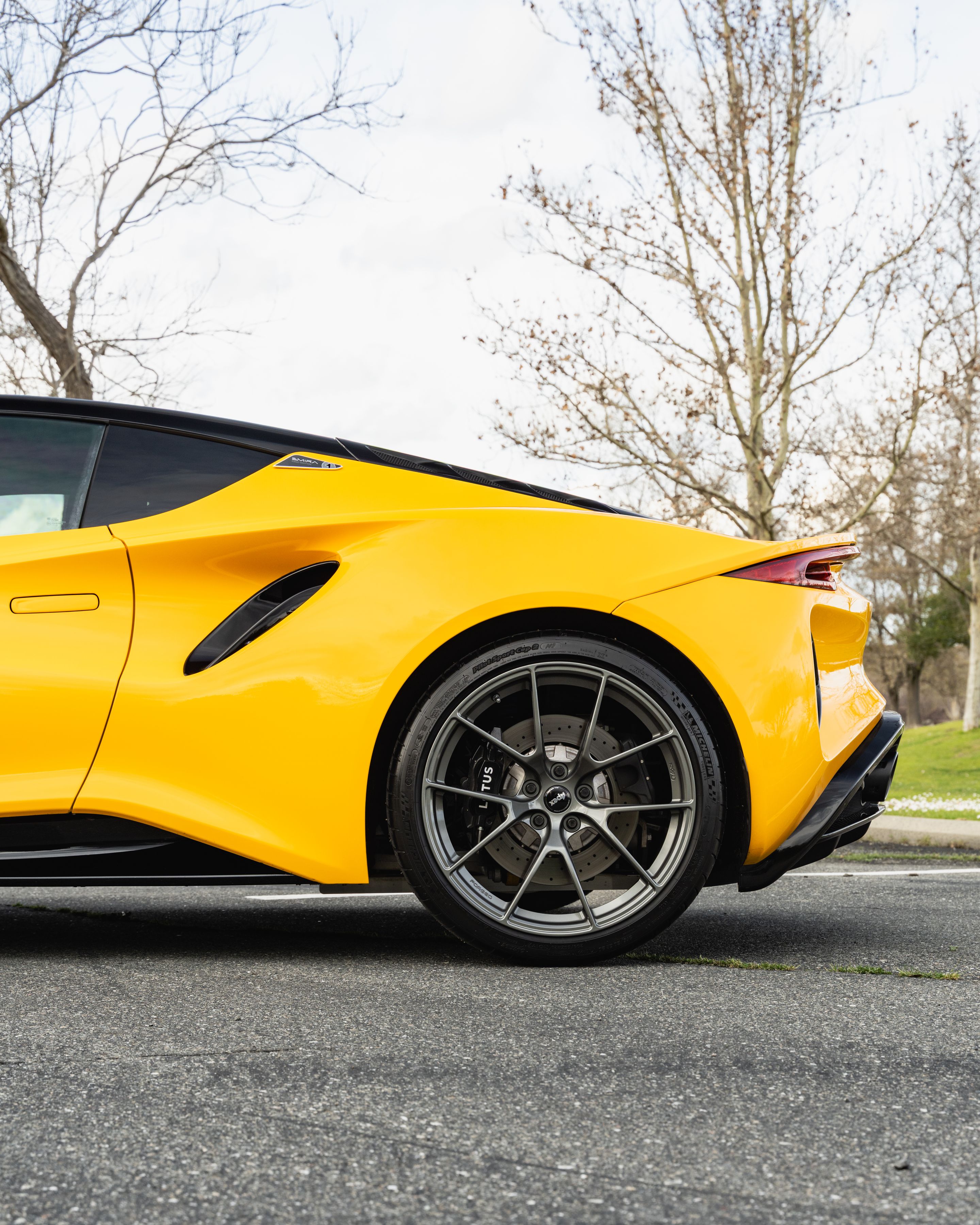 Yellow Lotus Emira with 20" VS-5RS Apex wheels in Anthracite