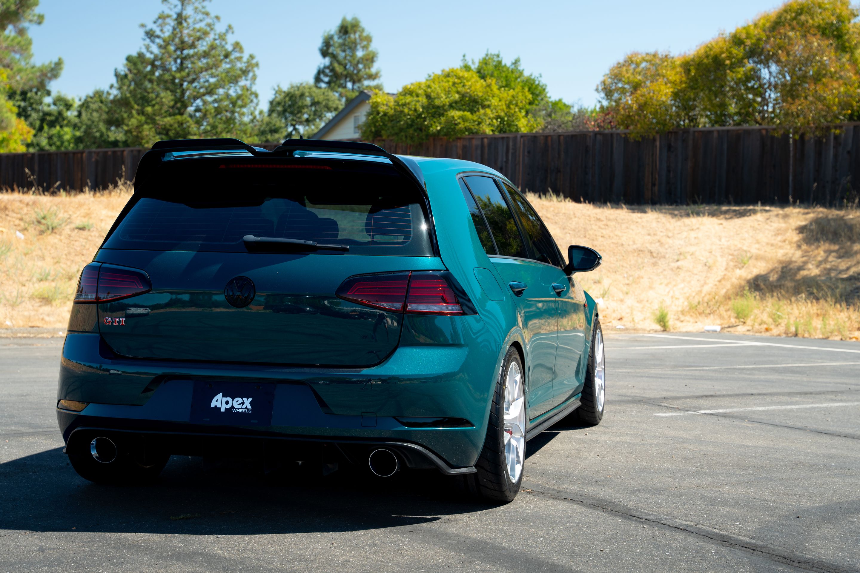 Green VW MK7 GTI with 17" VS-5RS Apex wheels in Brushed Clear